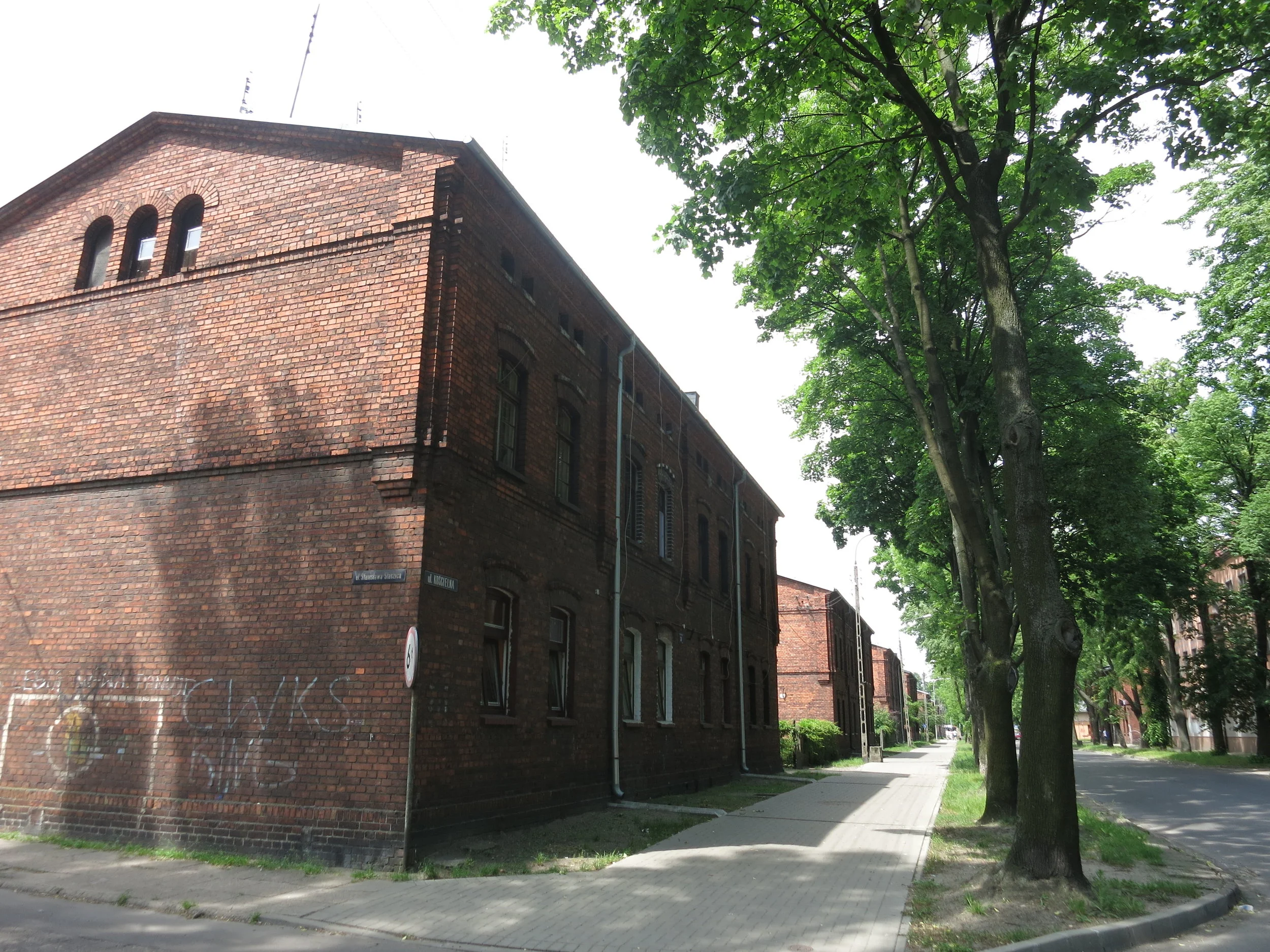 Nice green street with classic factory-worker housing.