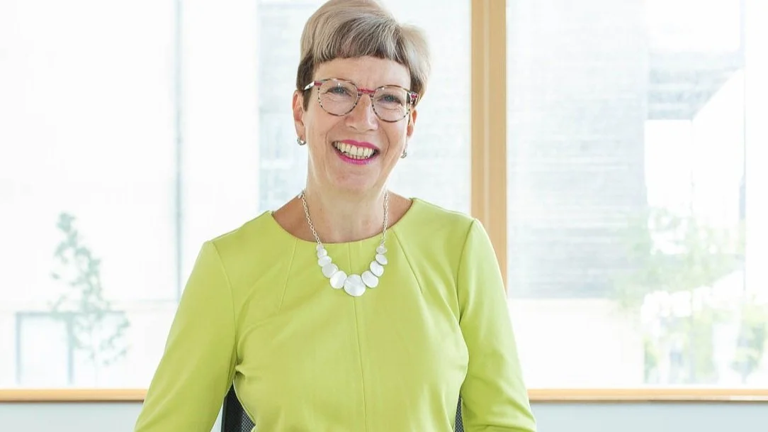 Workplace posture expert Alison smiling in head and shoulders photo.jpg