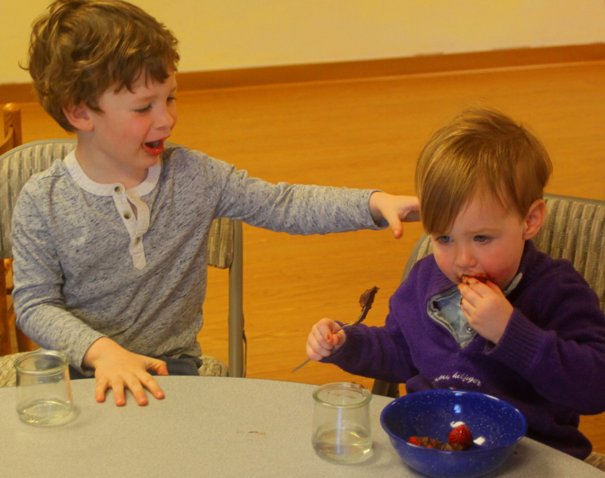 Lochlan and Sylvie eating birthday snack email.jpg