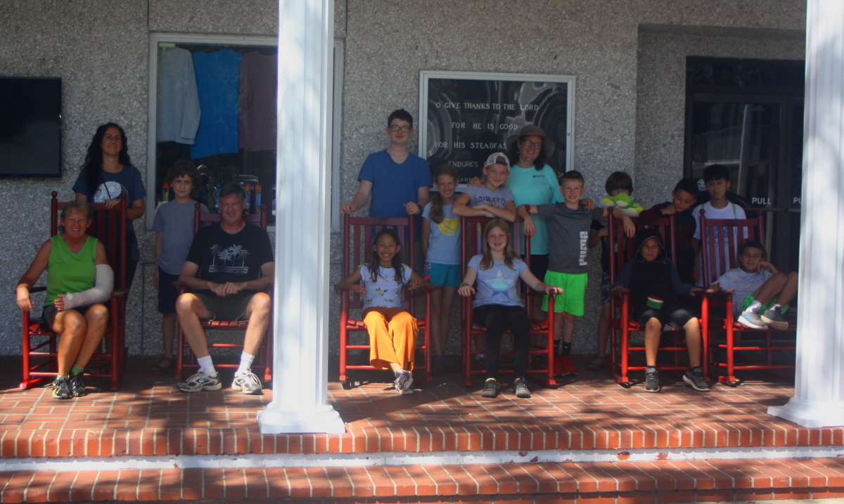 Group photo on the dining hall front porch email.jpg