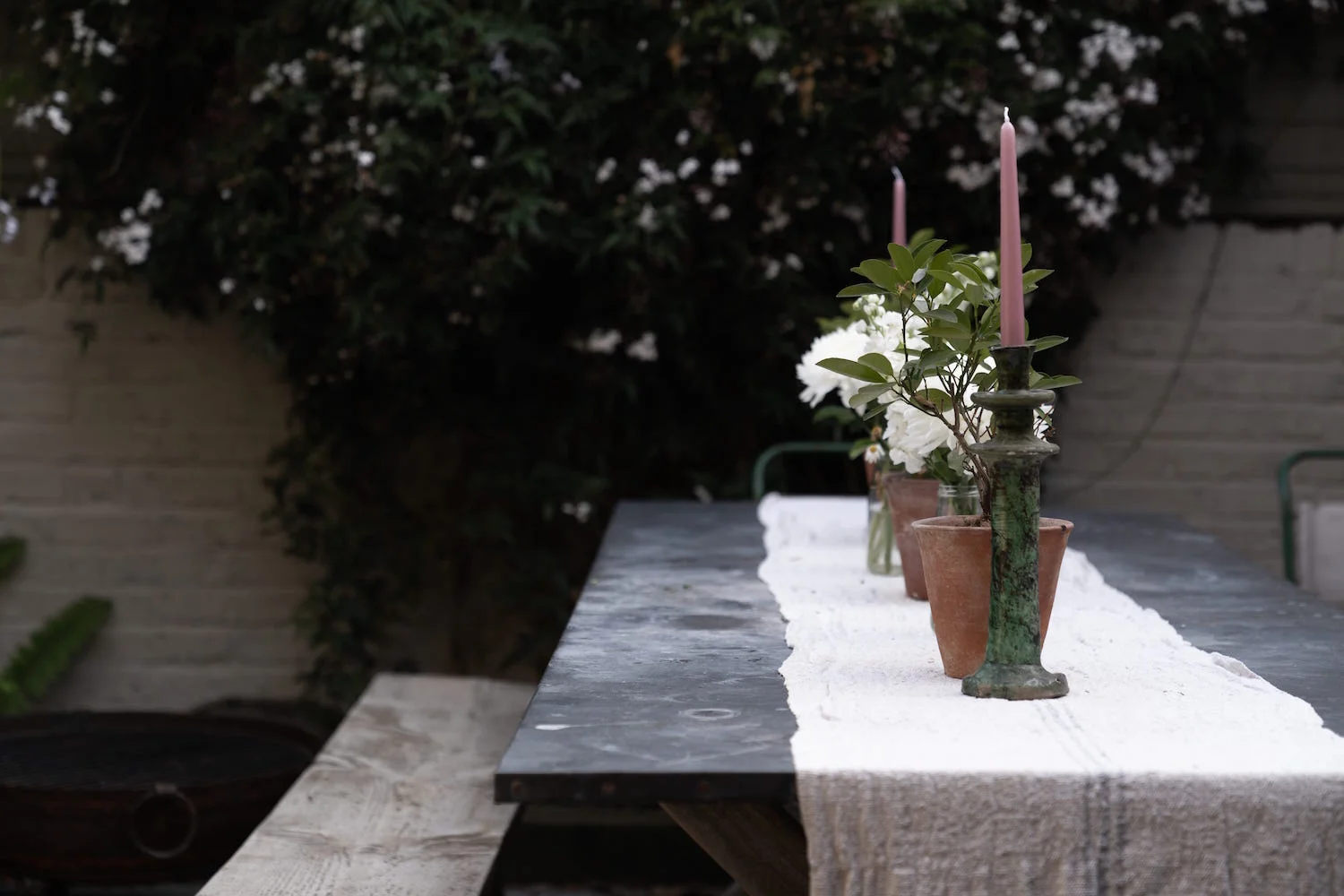 Antique French grain sacks are a motif throughout Julianna’s home - used as table runners, cushions and blinds.