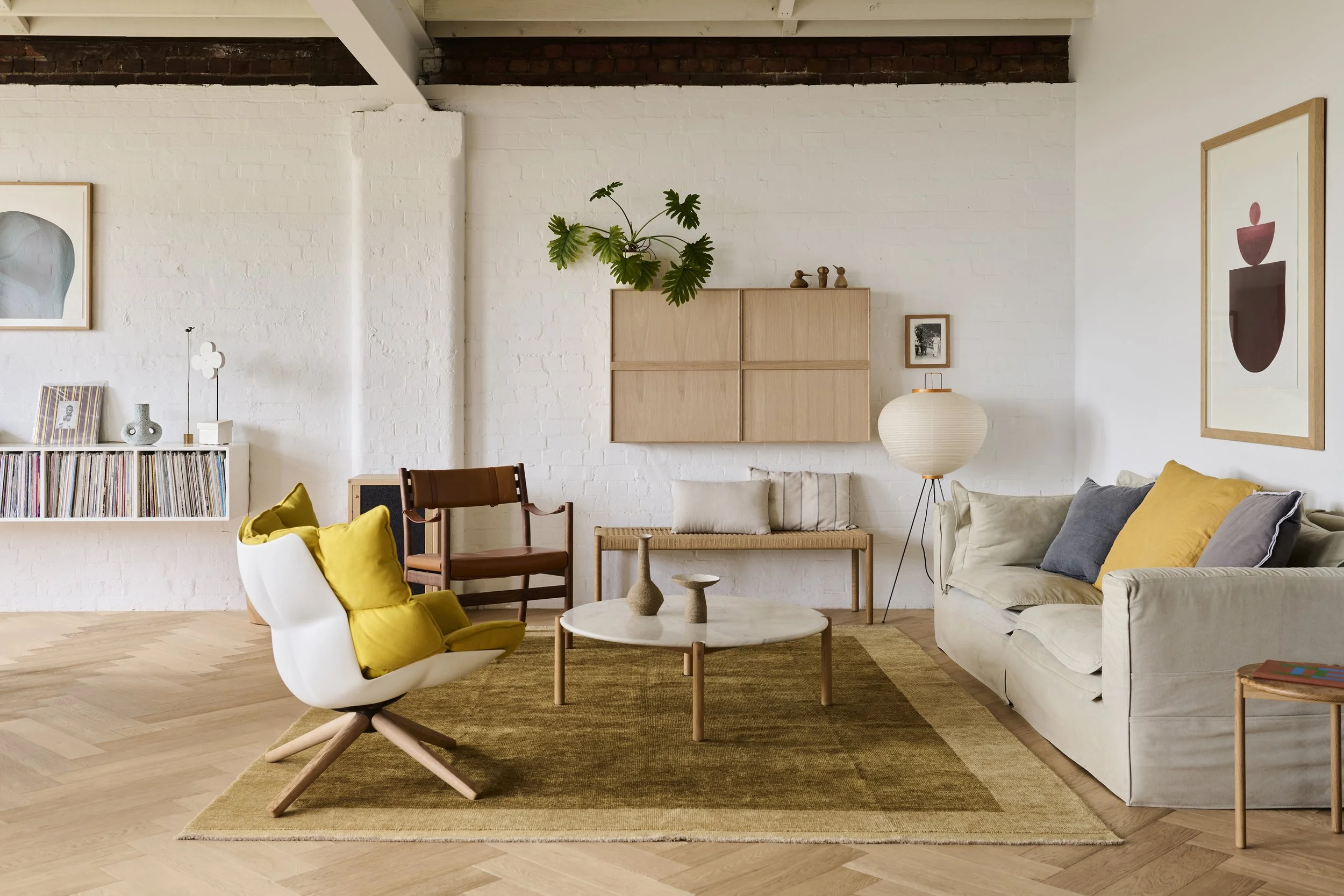 Parquetry Floors by Made By Storey , George St Armchair , AOS-T Side Table, AOC-T Coffee Table, Custom TV and Record Cabinets , Woven Bench Made By Morgen, Rug by Halcyon Lake , Flower limestone sculpture by Den Holm , Brass Flowers Scu