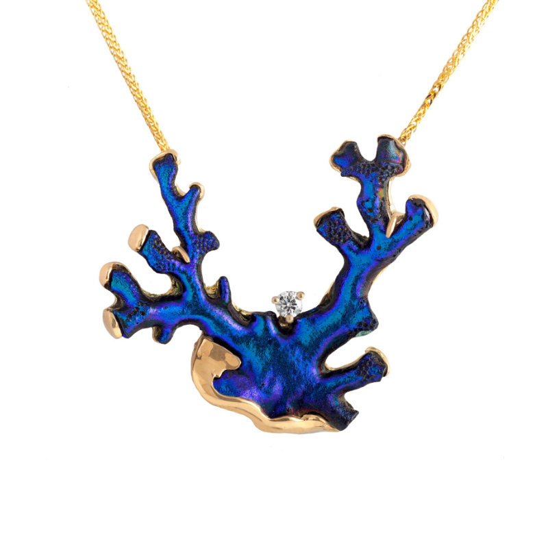 Necklace with natural coral (Japan) infused with titanium and diamond (.25 cts), set in 18k yellow gold