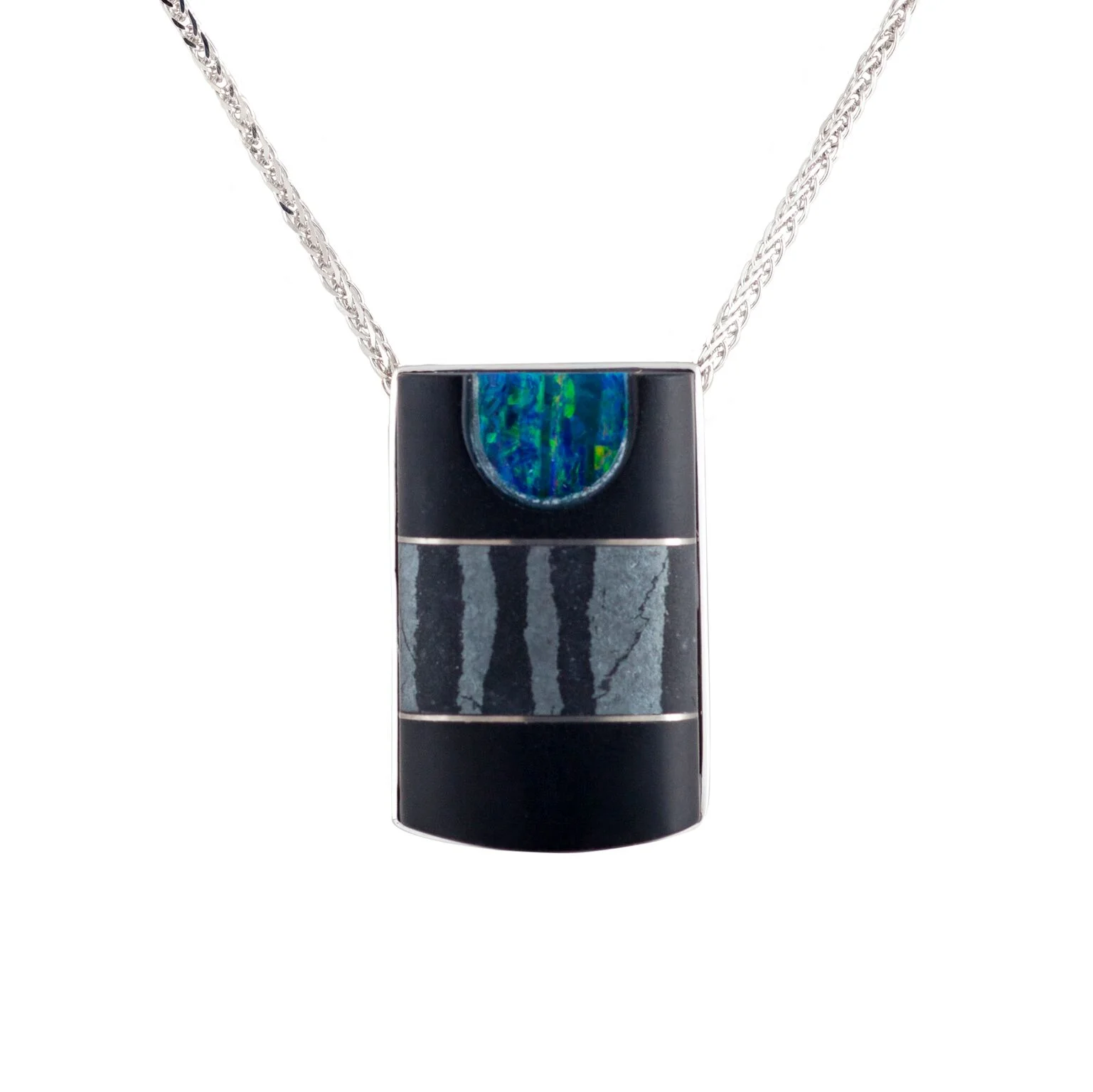 Black opal (Australia) and hematite fused onto a black jade pendant, with titanium, set in 18k white gold