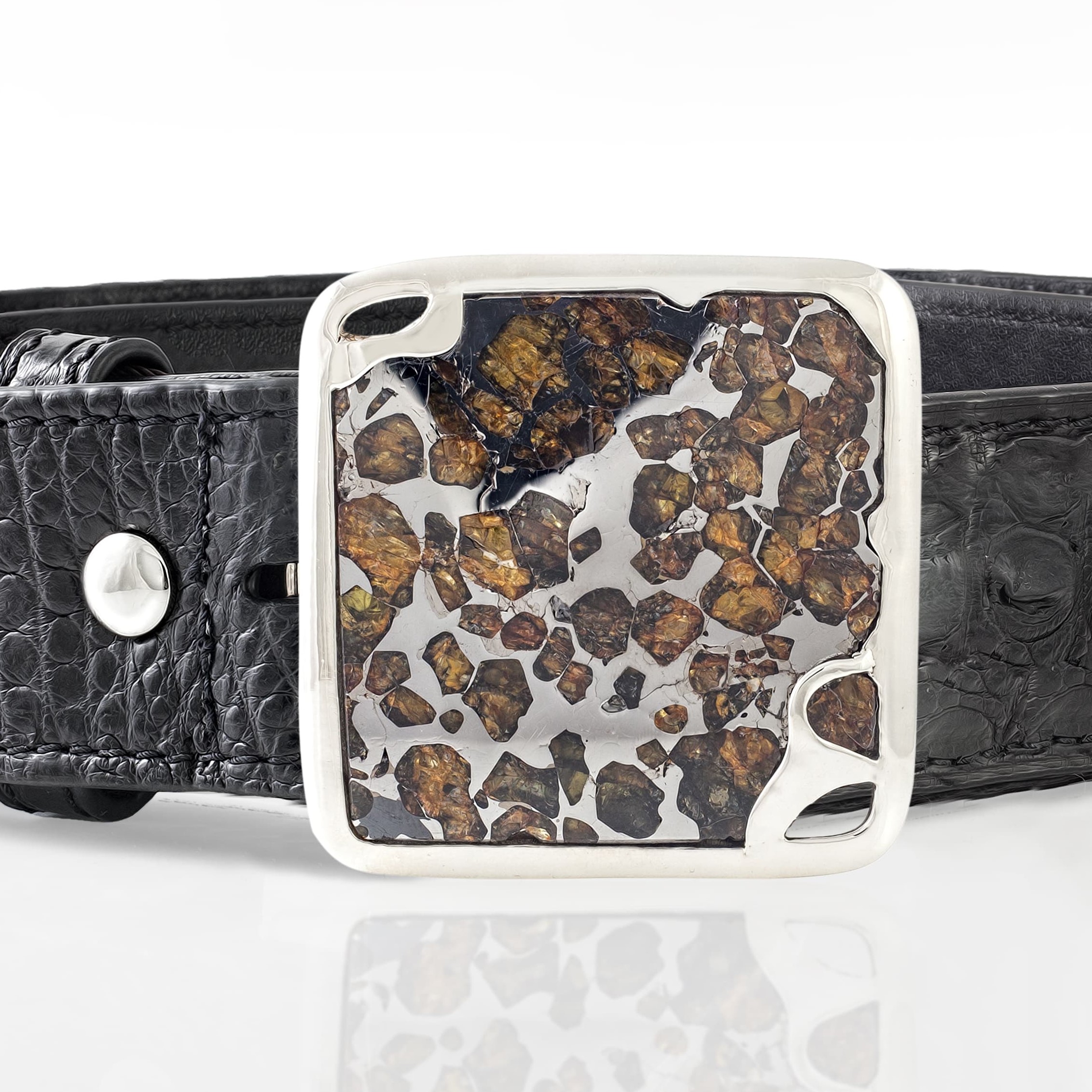 Pallasite meteorite (Russia) set in 925 silver, on a crocodile leather belt
