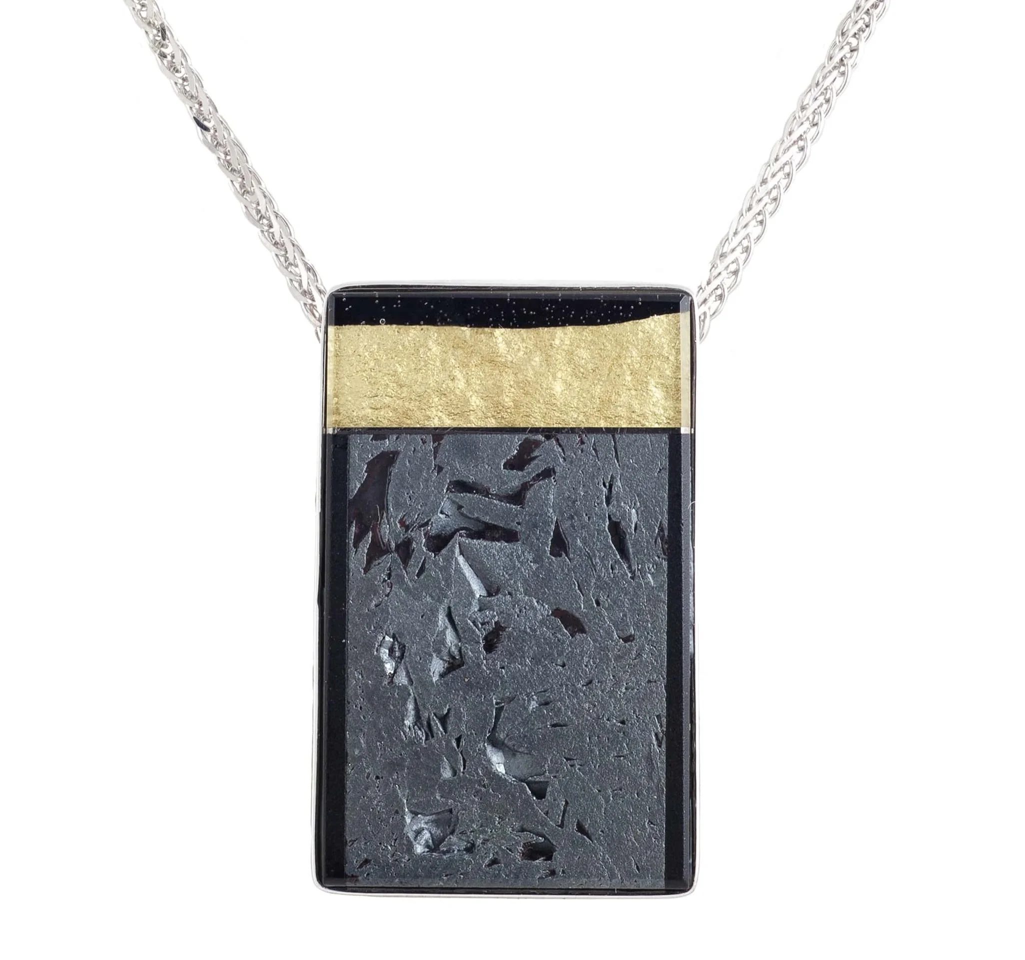 Meteorite (Russia) and 22k yellow gold covered by thin layer of rock crystal quartz pendant, with a 18k white gold bezel and mother of pearl backing