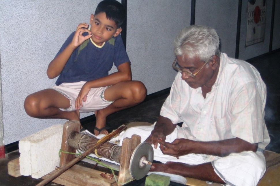 A young Aly was fascinated by one of the lapidaries at work at the family factory