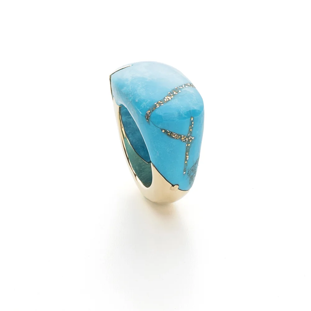 Sleeping Beauty turquoise from Arizona with golden pyrite pinpoint inclusions, set in 18kts yellow gold ring.