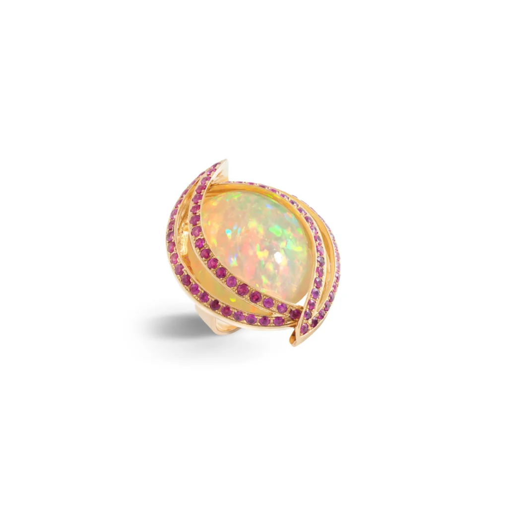 Natural cabochon opal (Ethiopia, 27.8 ct), round brilliant-cut ruby (Myanmar) pavé, set in 18k yellow gold ring