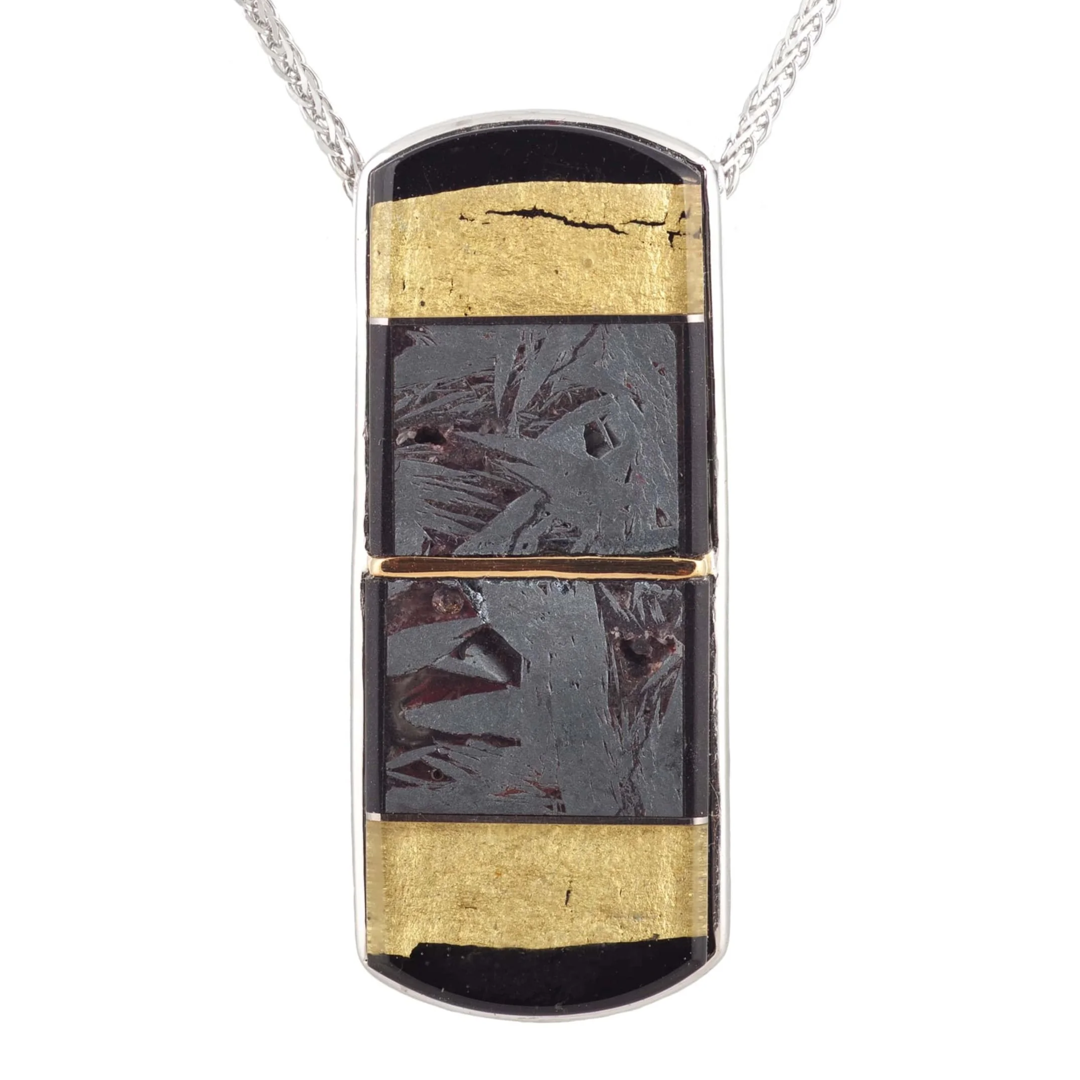 Meteorite (Russia) and 22k yellow gold covered by thin layer of rock crystal quartz pendant, with a 18k white gold bezel and mother of pearl backing