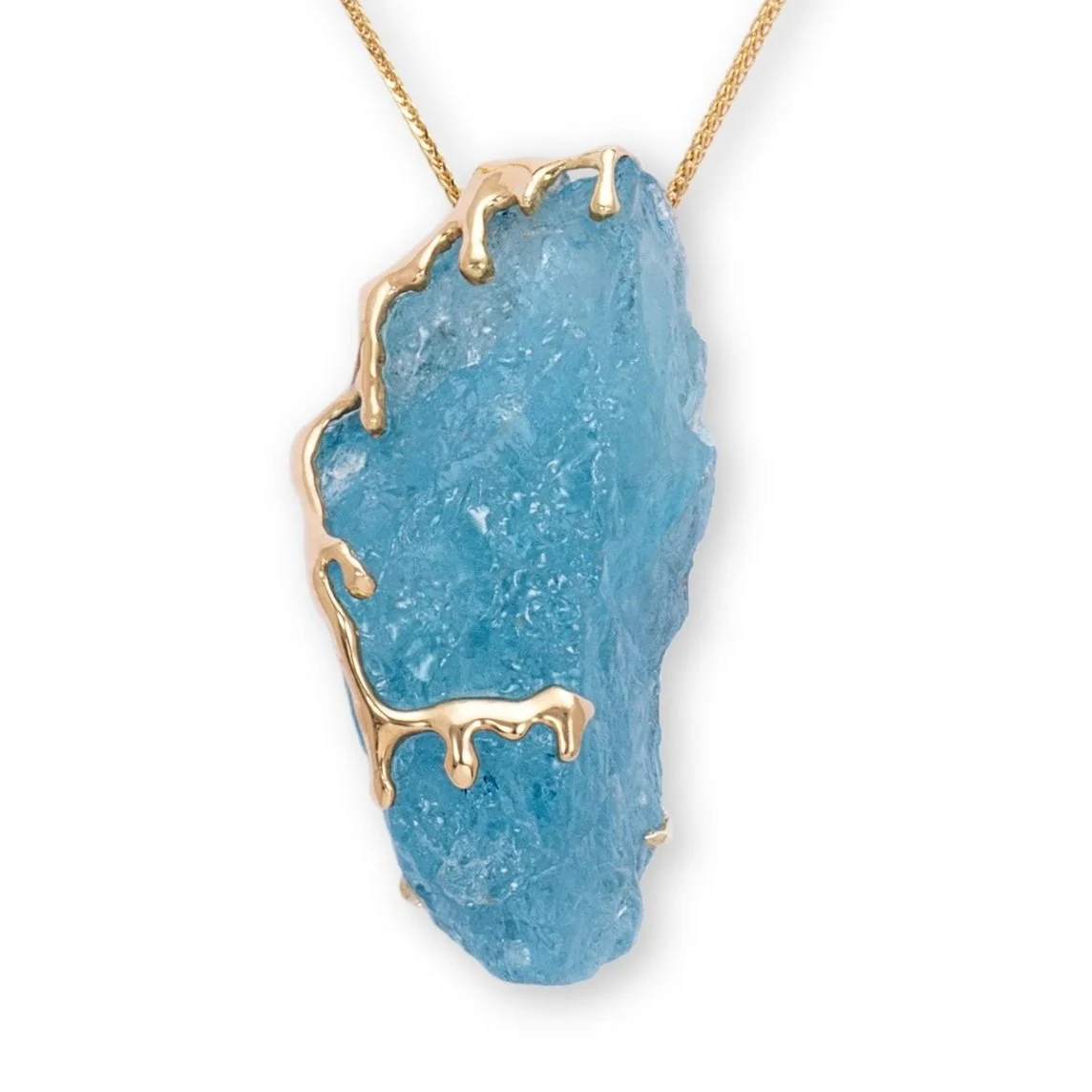 Natural+rough+aquamarine+from+Madagascar+%2872%2C8+cts%29+set+in+18+kts+yellow+gold-white.jpg