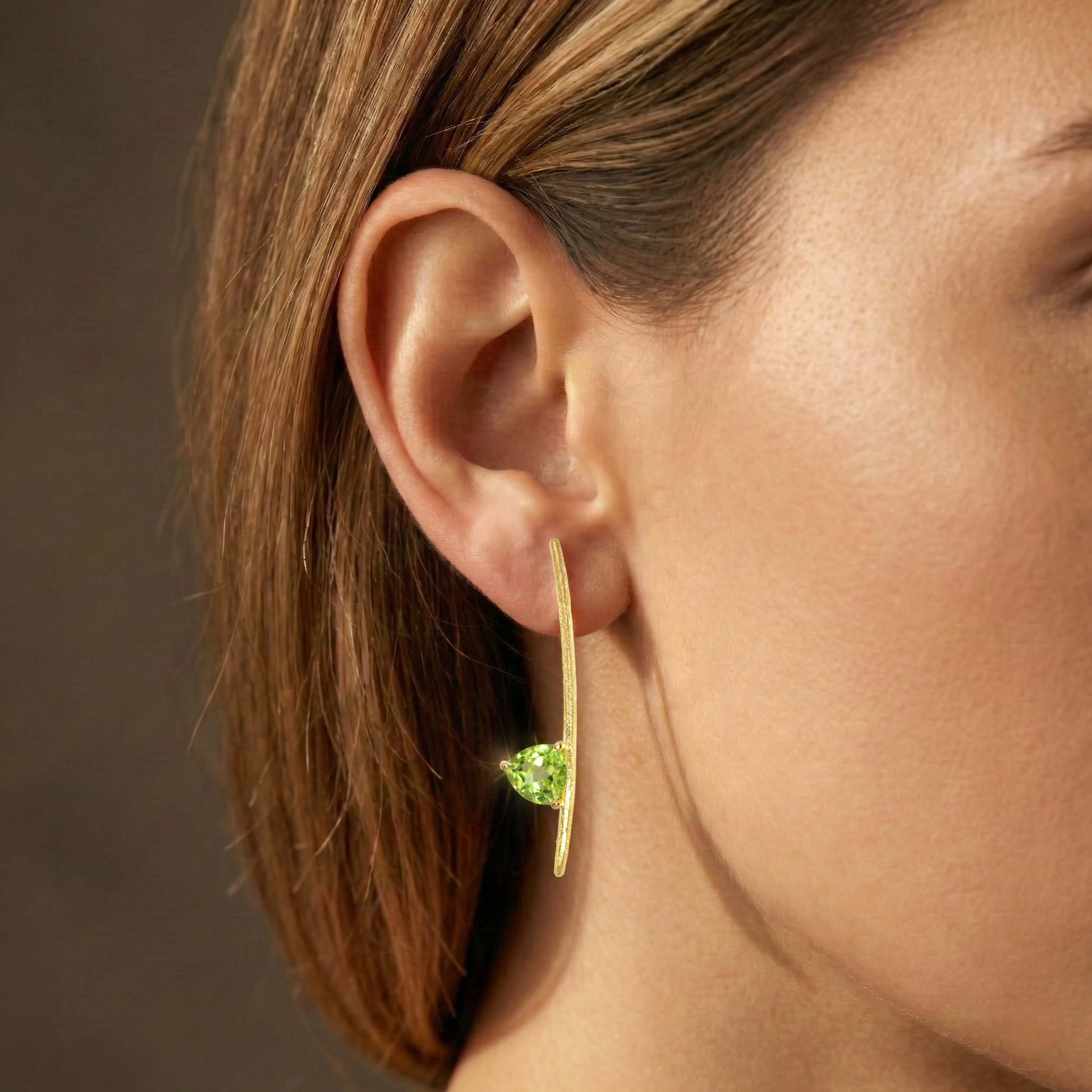 The Guiding Star Collection Triangle peridot earrings.png