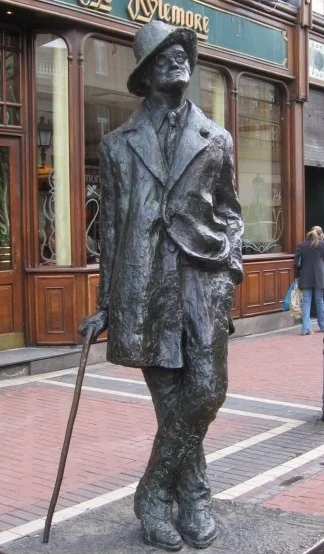A statue of James Joyce, located near the site of Mooney's pub.