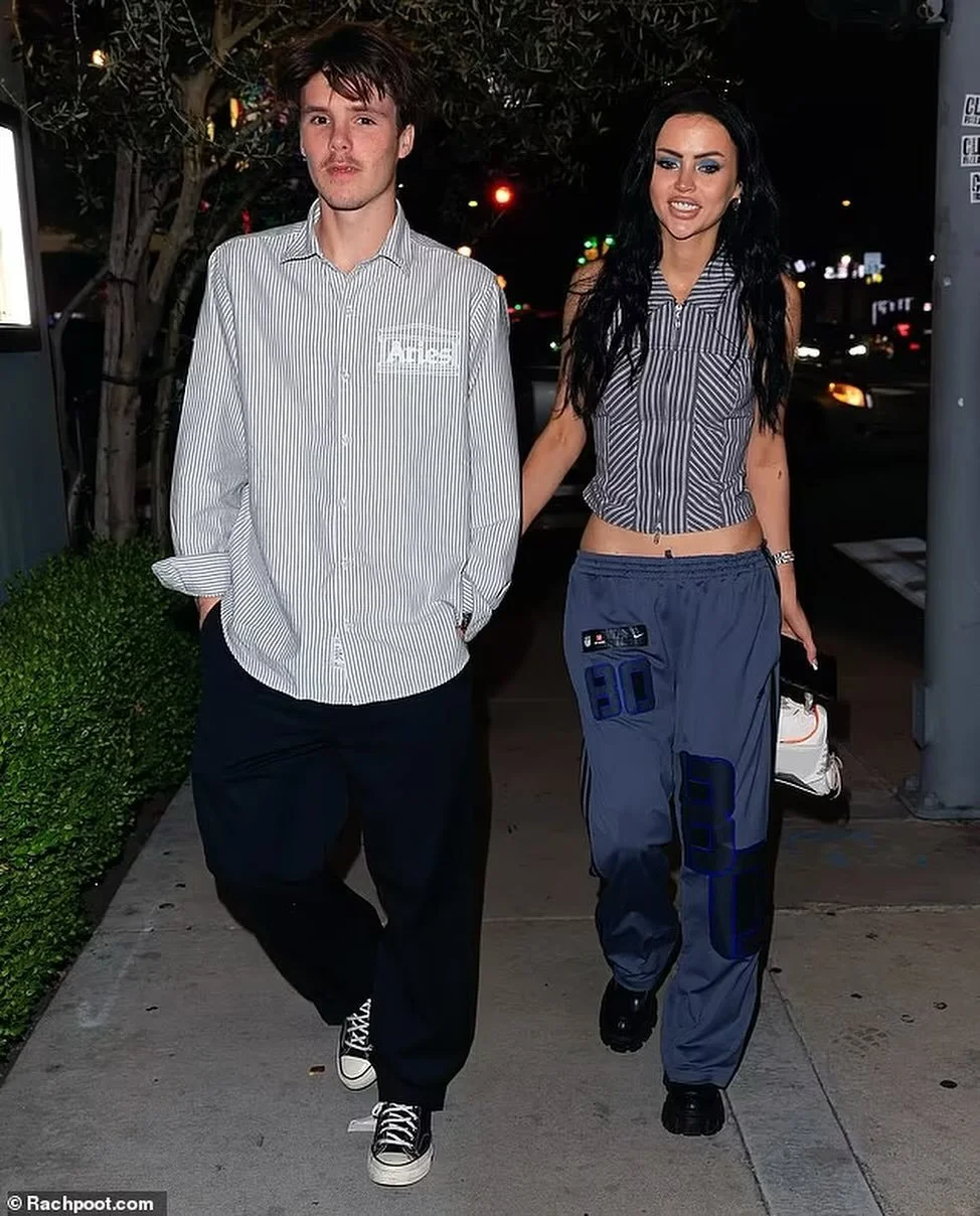 Cruz Beckham looks dapper in a pinstripe grey shirt as he steps out for dinner in LA at @osteriamozza with his stunning girlfriend, Norwegian Singer BBY Ivy. Photos by @bobby_pap_la. 

#cruzbeckham #bbyivy #arprclient