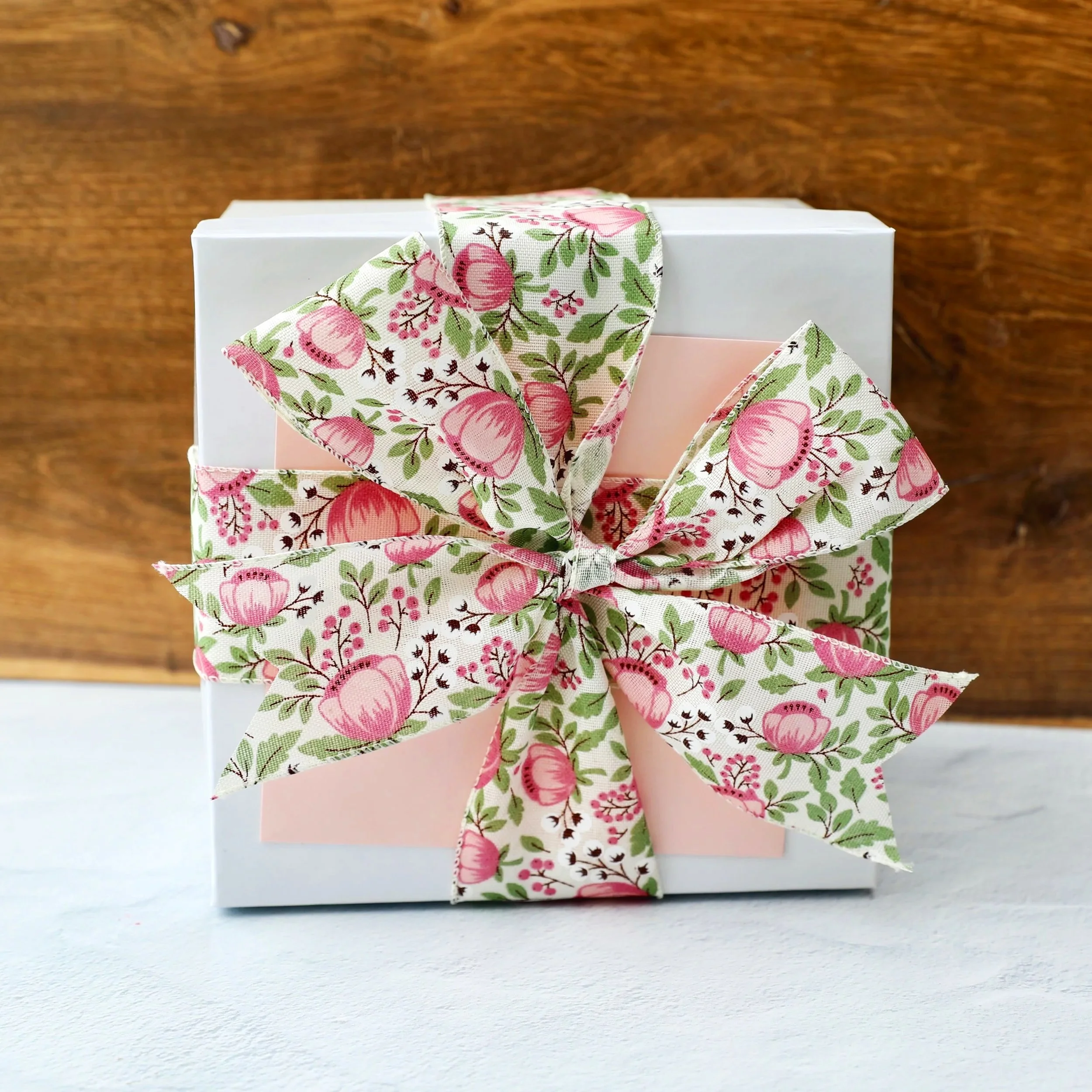 White Mother's Day Gift Box with a floral ribbon blue and pink envelope