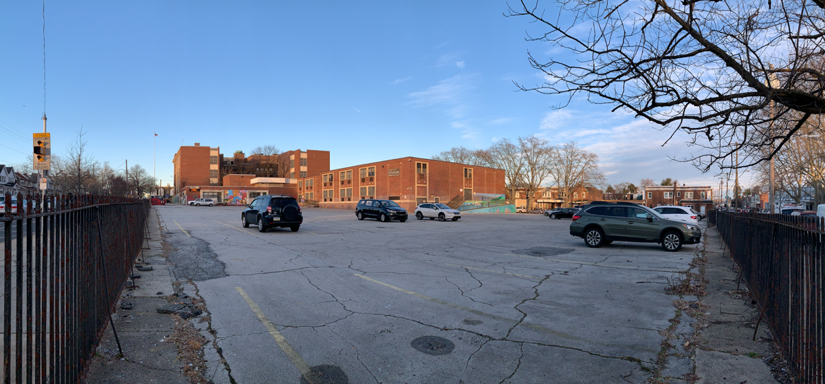 Two thirds of the playgrounds in Philadelphia don’t have a playground, and many look like this: acres of asphalt, very little shade, and cars parked where children could be playing.