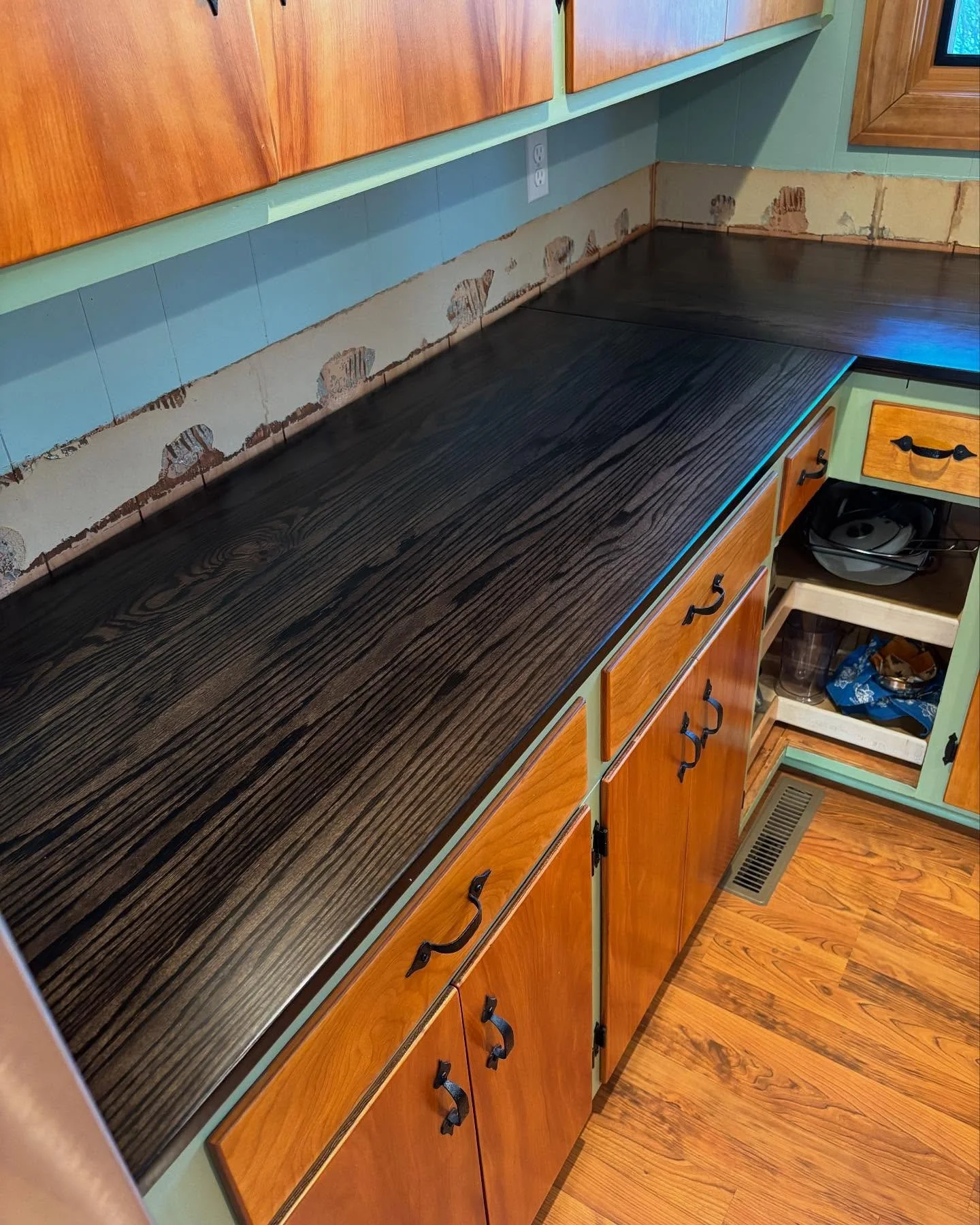 Red oak countertops, black stain and epoxy satin finish. 

On to the backsplash! (and doors for that corner cabinet)
.
.
.
#hornbeamcraft #kitchenrenovation #redoak #countertops #michiganmade