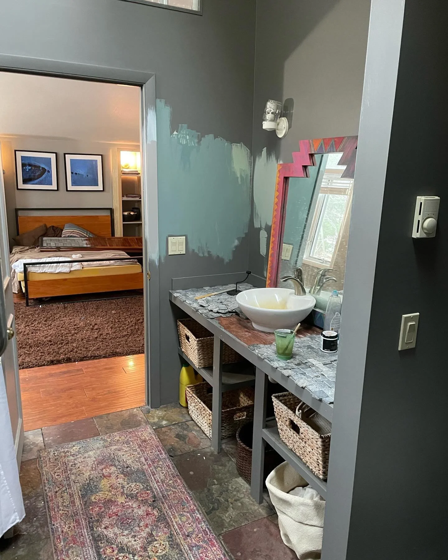 Bathroom makeover with a little bit of custom tile work, new paint and trim&hellip;I liked working with the &ldquo;pebble-mesh&rdquo; but ran short and had to do a few custom slate landings on either side of the countertop. Turned out pretty cool. 


