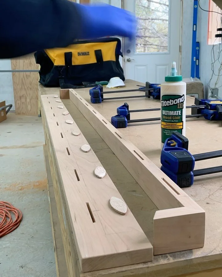 I like to make projects all from the same board or tree to keep coloring and grain harmonious with the least extra effort. The grain of the mantle&rsquo;s apron wraps around the sides to keep the transition smooth.