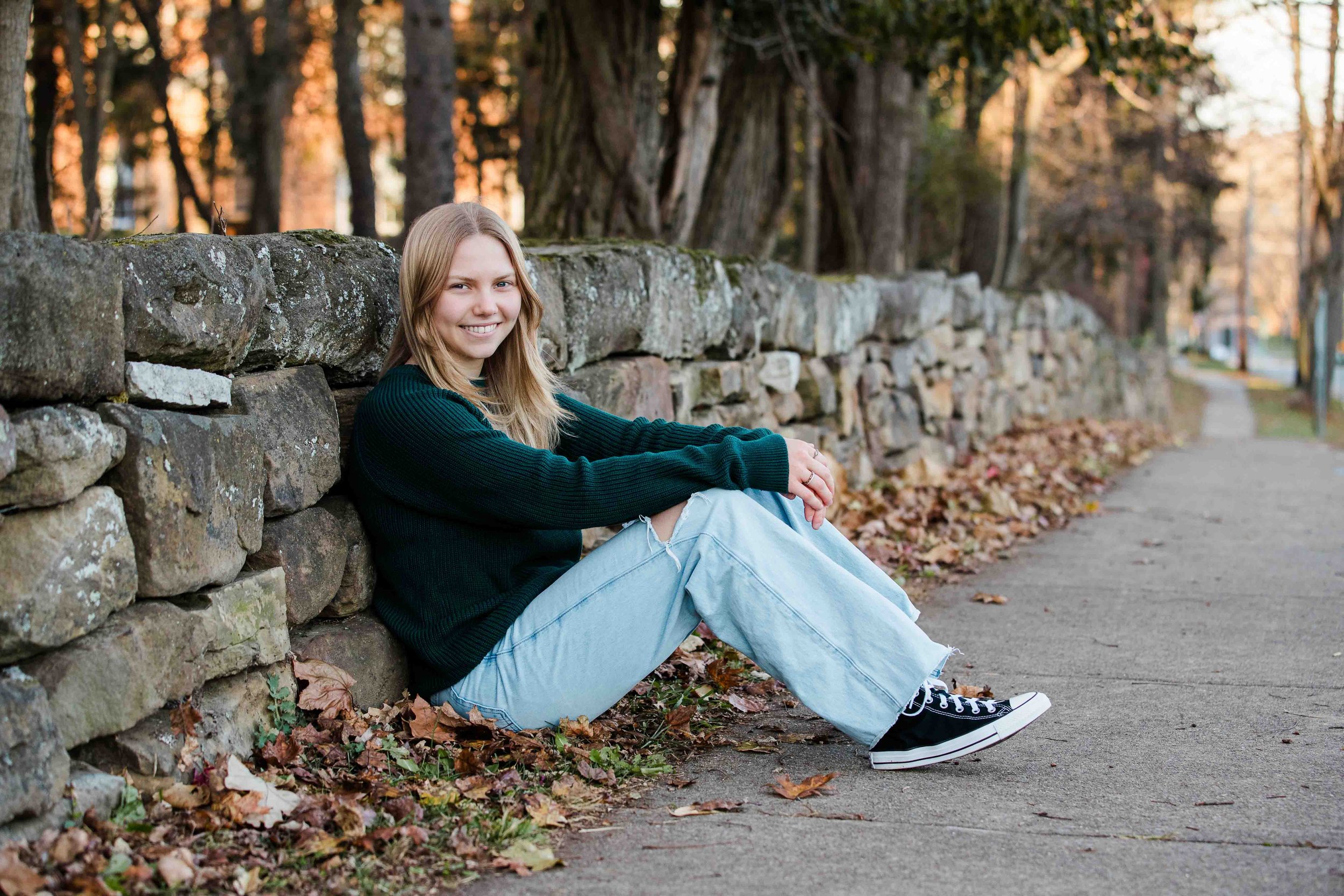 Senior Girl Portrait Against Stone Wall in Central Ohio.