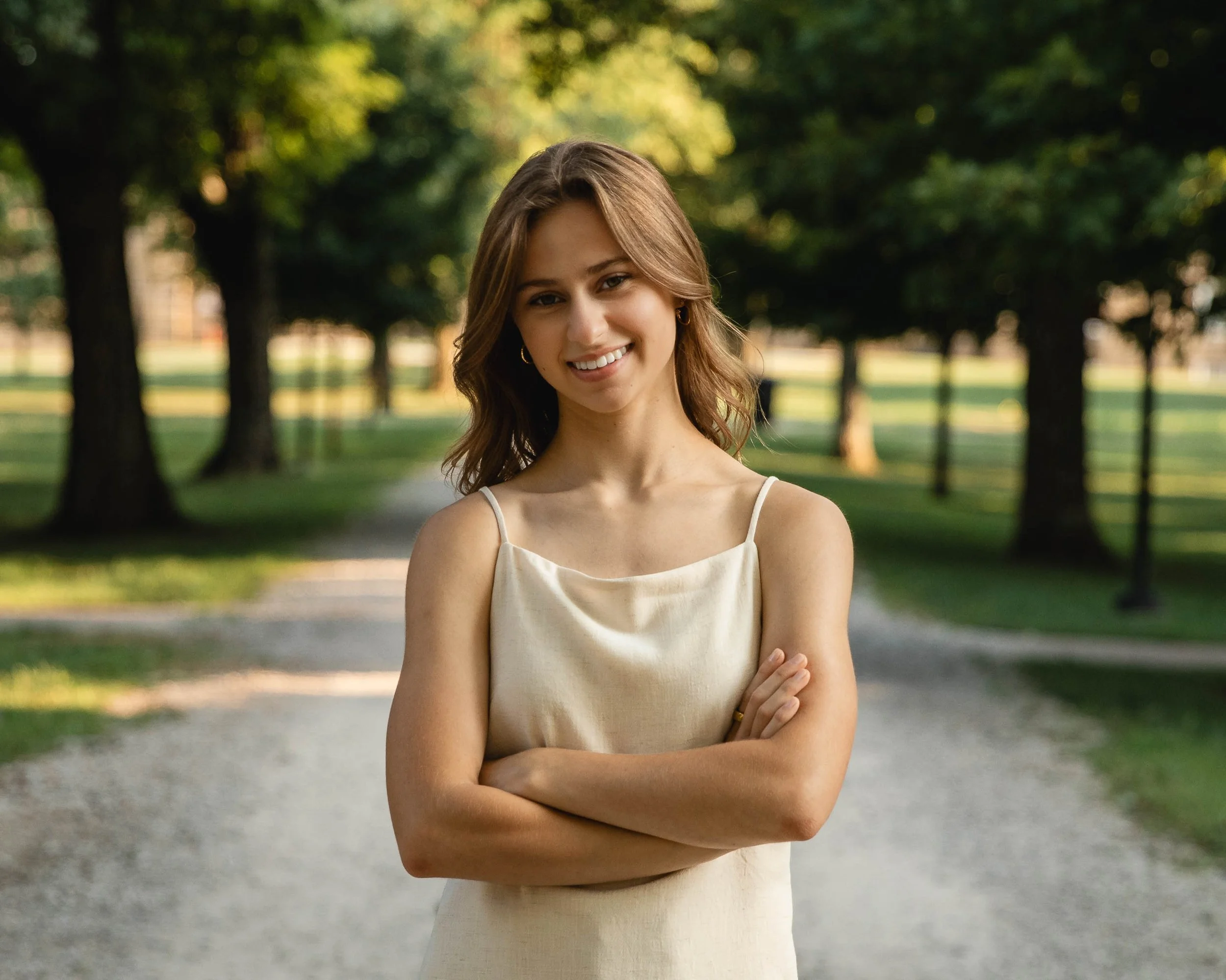 Mount Vernon Senior Standing In Golden Hour Light In Gambier, Ohio.