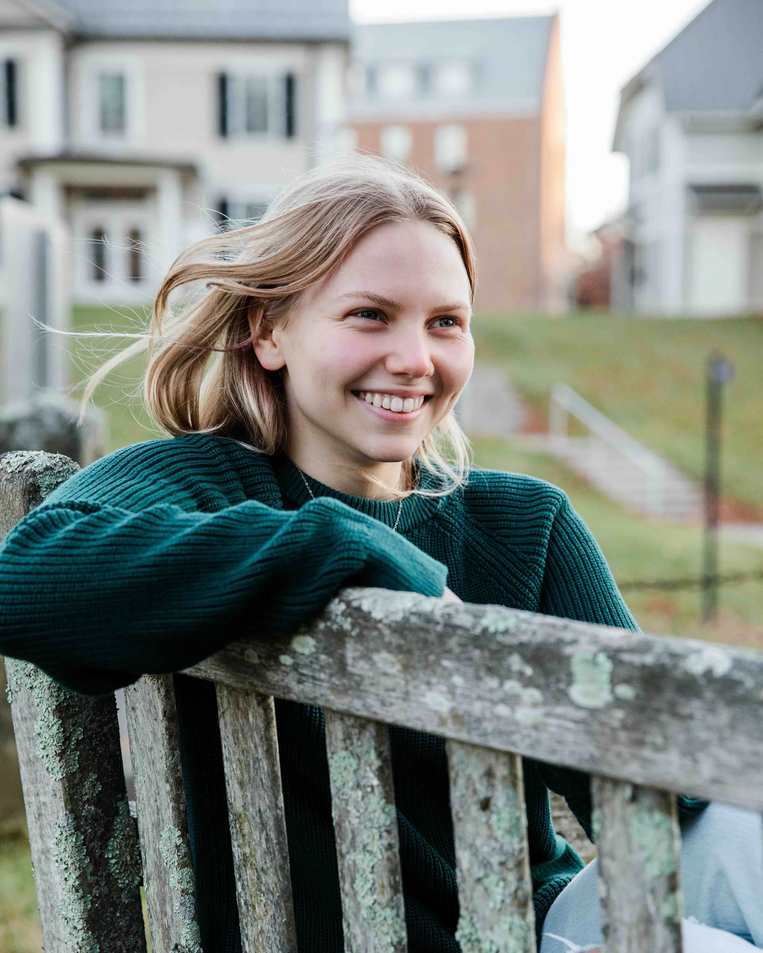 Senior Portrait with Big Smiles on Park Bench