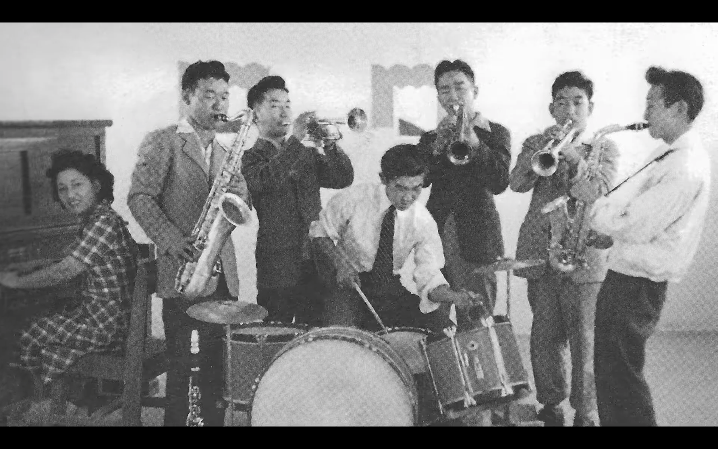 *Swingposium group band woman piano.png