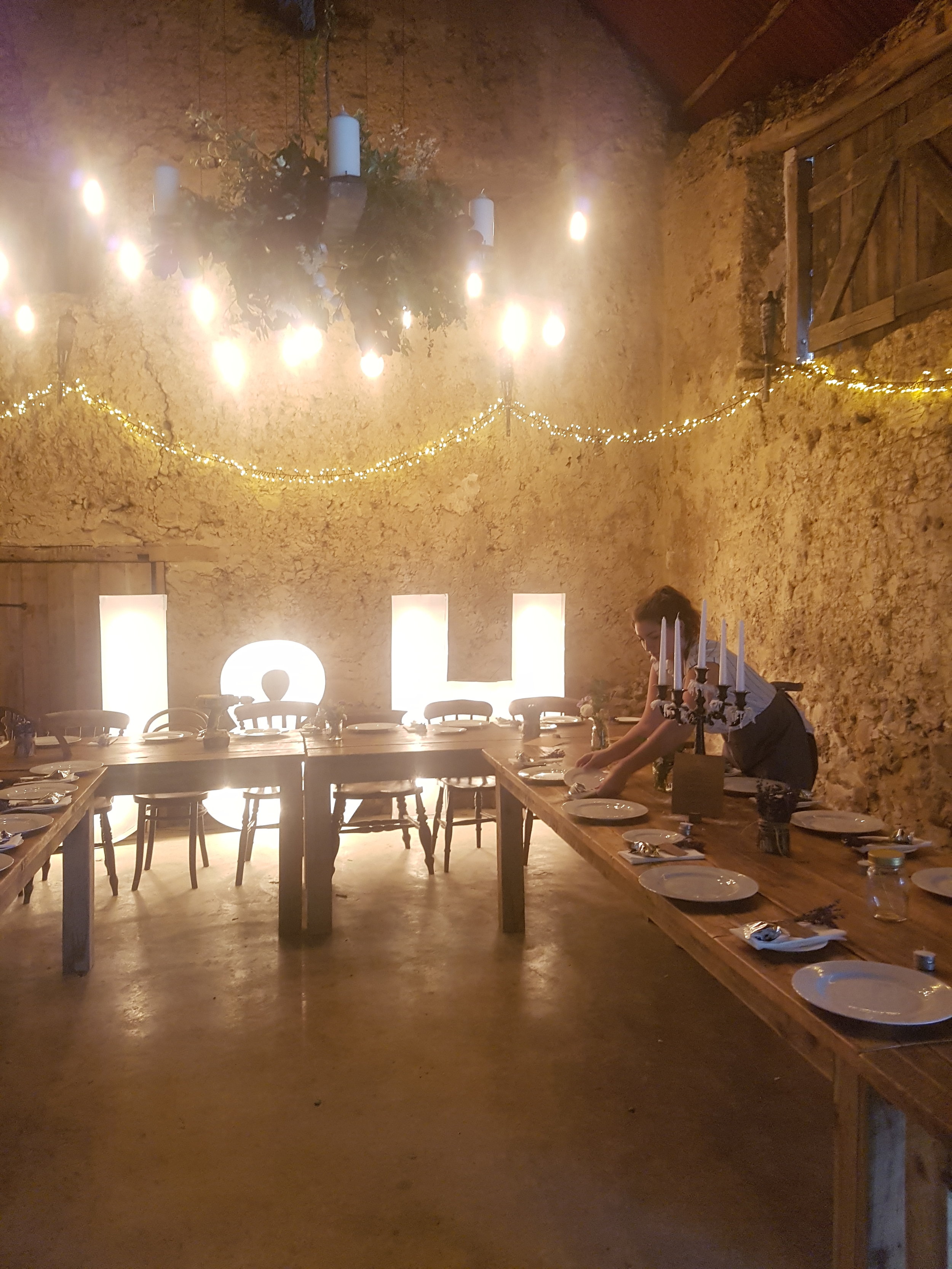  Assistant manager Maddie overseeing the final touches in the beautiful medieval barn at Higher Eggbeer. 