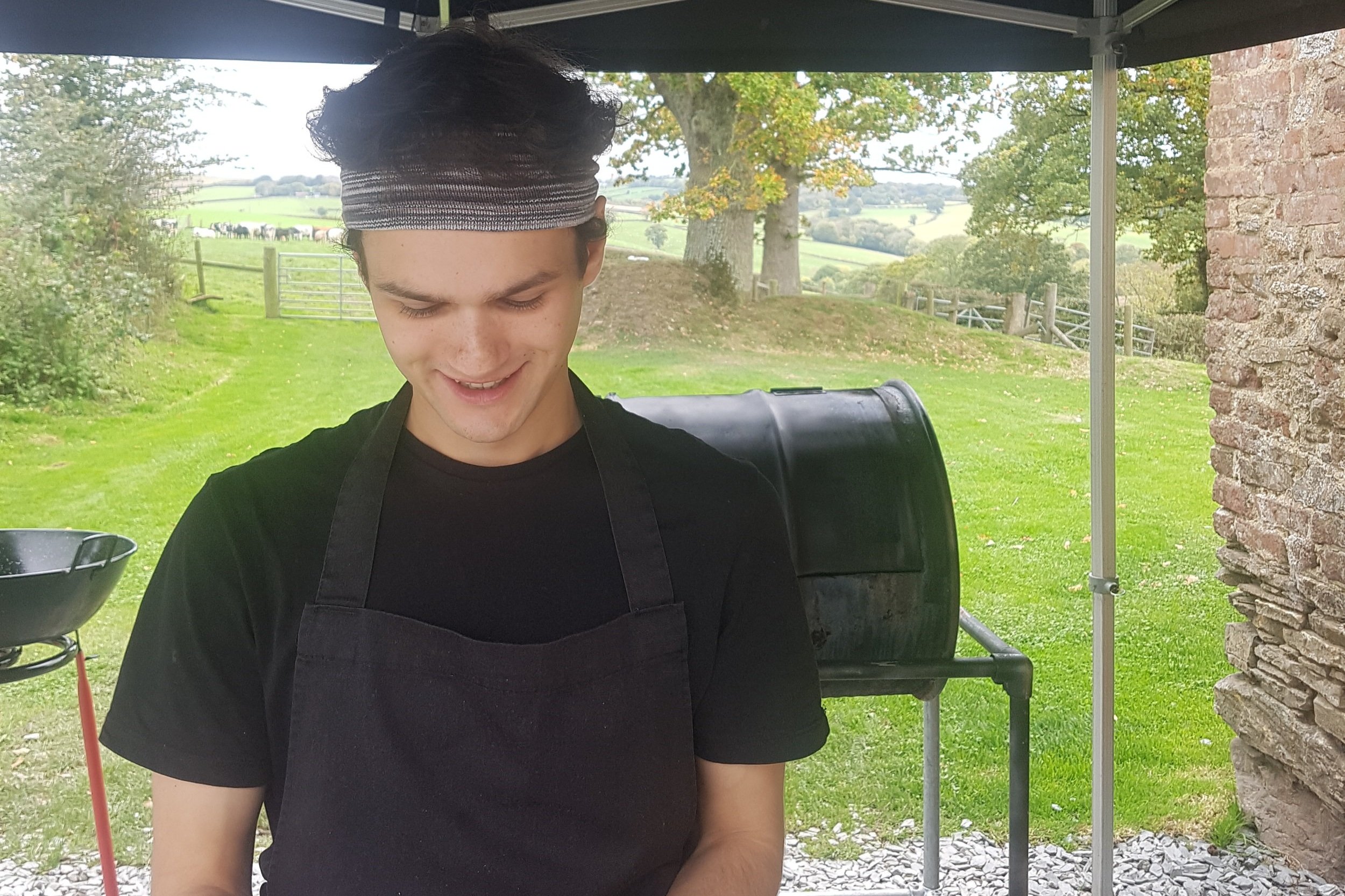  Sous Chef Jacob getting ready for some hot smoked pork loin on the bbq at Higher Eggbeer Farm. 