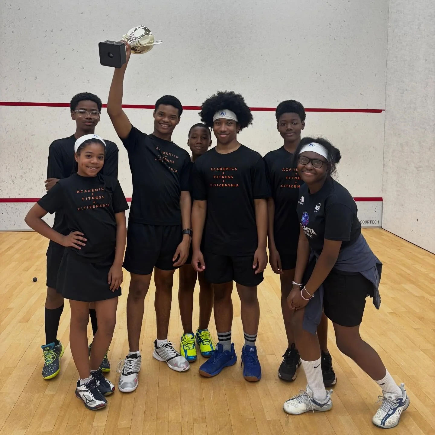 🏆 Black Team takes the trophy at A+ Family Day 2026!

Black Team took a 6-3 win over Blue Team in the final match of the season, then we celebrated with Coach Darryl&rsquo;s BBQ, quality time on court with family &amp; friends, and our annual awards