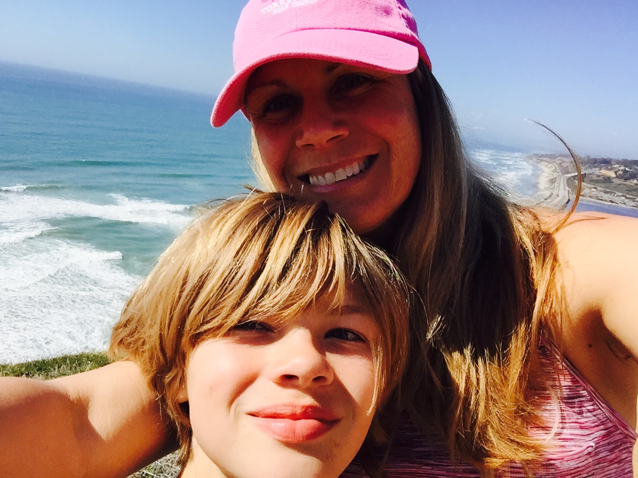 Jennifer Harney (with oldest son Miles) I coach: Team Rogue in Cedar Park Background: I started running as kid with my mom and have loved running & coaching every event from the 400m to the marathon. Years Coaching & Philosophy: 16 yrs; Balance your life & running so you can enjoy them both long-term. Best advice for new Rogues: Have patience...don't rush the process. Most memorable run/race: All of them. Interesting fact: I can quote both films entirely - Field of Dreams & Beverley Hills Cop.
