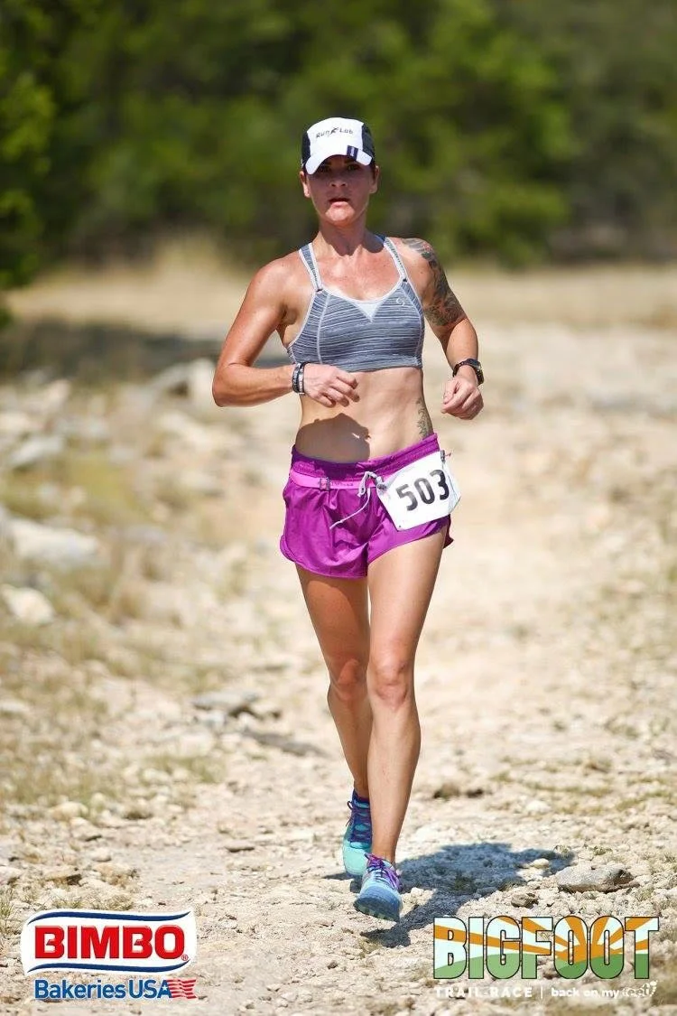 Vanessa Mitchell I coach: Rush Hour an on-going group in Cedar Park Background: I started running at 19 and fell in love. I started coaching 2 years ago and fell in love again! Years Coaching & Philosophy: 3 yrs; I believe in positive expression, dedication, setting attainable goals, and practicing patience. Do the hard work and make a lot of friendships along the way. Best advice for new Rogues: Buy a foam roller & use it! Most memorable run/race: My first 5K is still my favorite race ever! I had no idea how awesome and weird it was that people (some in costume) gathered to run through the streets together. I won 3rd place in my age group -- didn't realize awards were a thing there either! I was hooked. Interesting fact: I once did 500 burpees in a day. I do not recommend it.