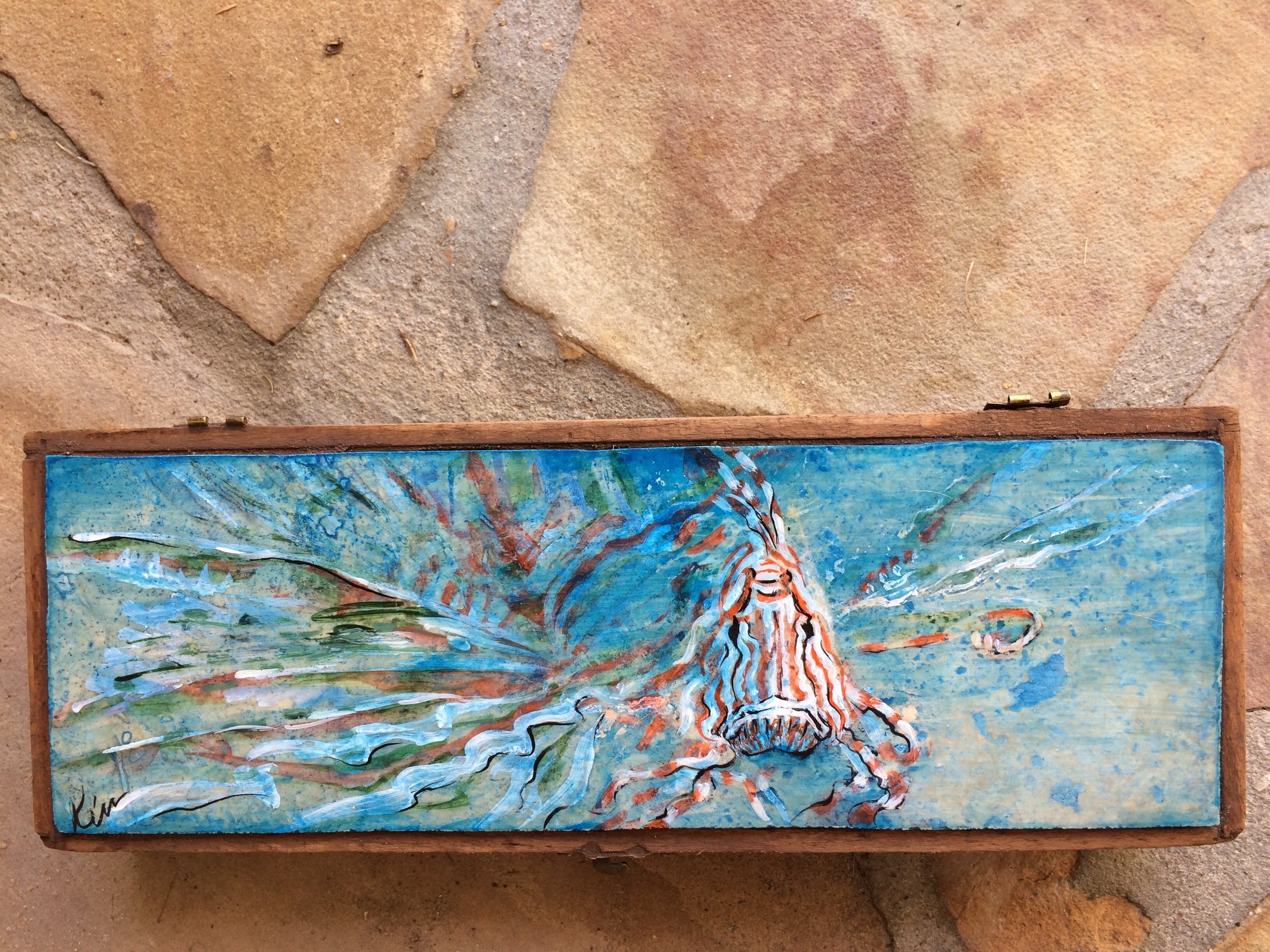 Lion Fish..stone painting in vintage wood polythorpe box, 11 1/2 " x 4" 