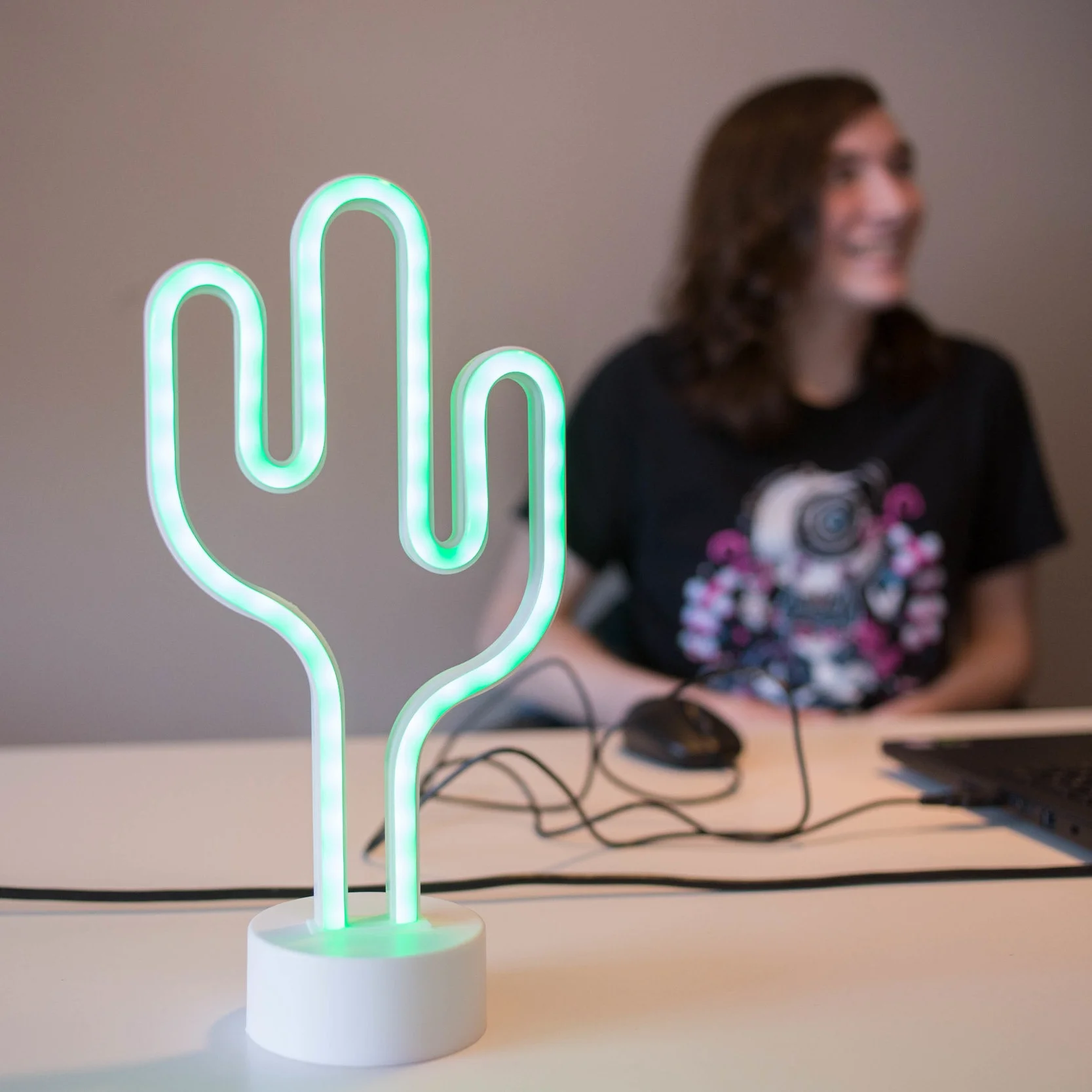 CEO Ryan Hinchcliffe (right) responds to compliments from the press on his exemplary cactus (left).