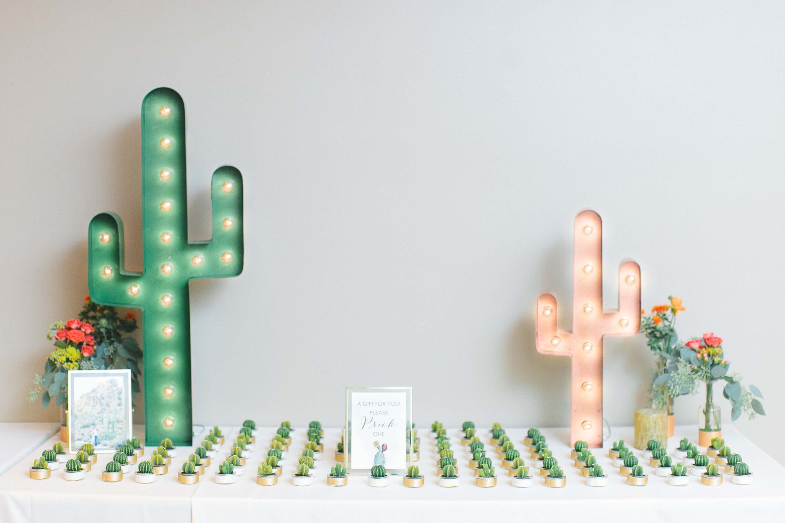 Cactus candle wedding escort card at Sanctuary Camelback Mountain Resort in Paradise Valley, Arizona