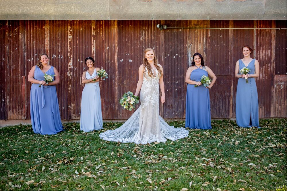 Dust blue bridesmaids dresses at The Barn at UVX Rustic Ranch in Cottonwood, Arizona