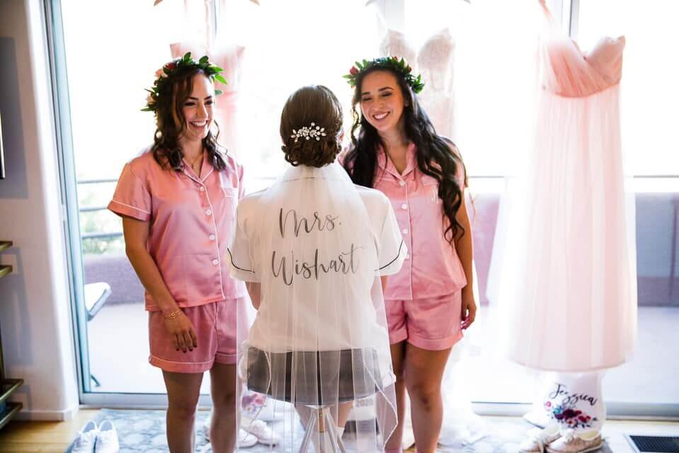 Bride getting ready with bridesmaids