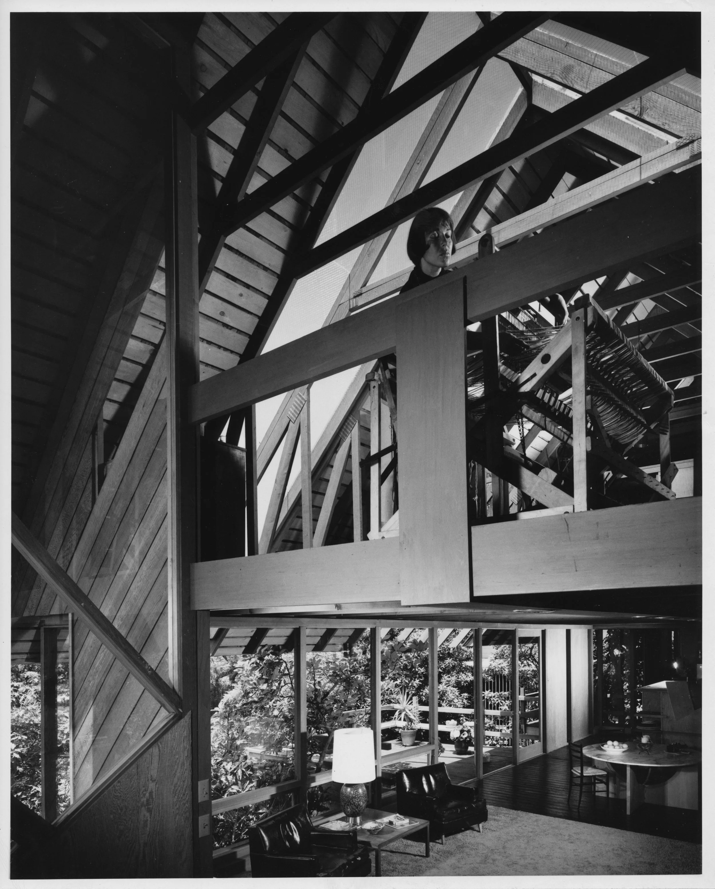 Here you can see my Mom, Jackie, up in the attic truss, in another photo by Julius Shulman.