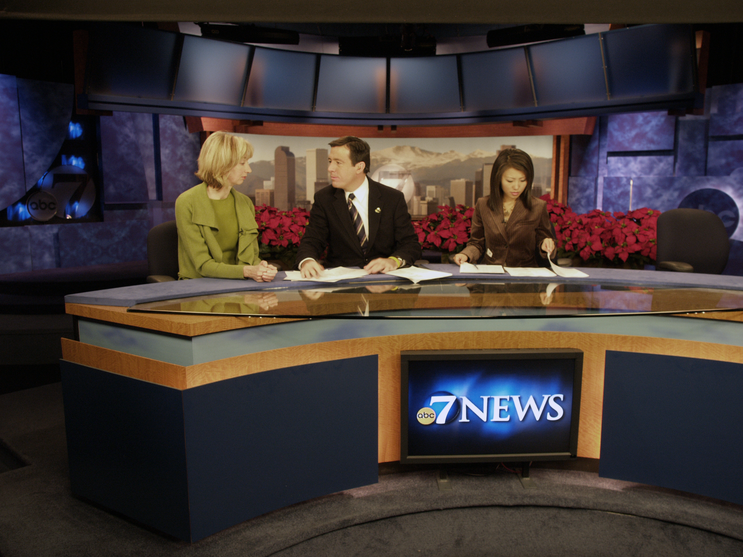 Elizabeth at the KMGH-TV news desk commenting on an architectural story.