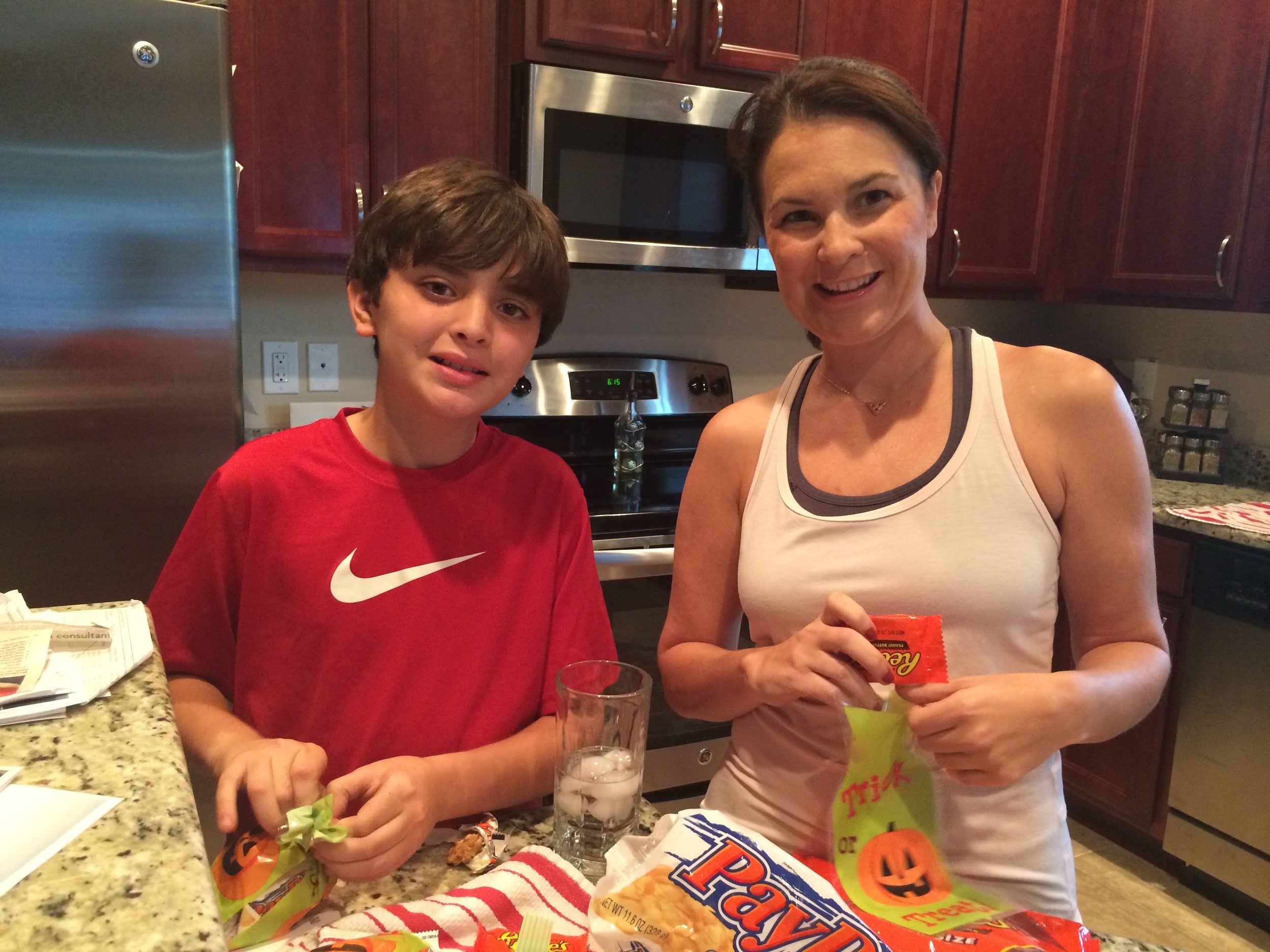 My nephew and me packaging up treats to advertise for a local non-profit