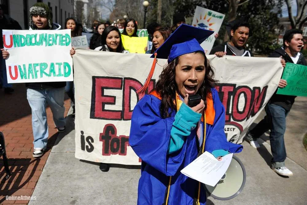 An undocumented high school graduate leads a protest against a ban on undocumented students at the University of Georgia. Photo from onlineathens.com.