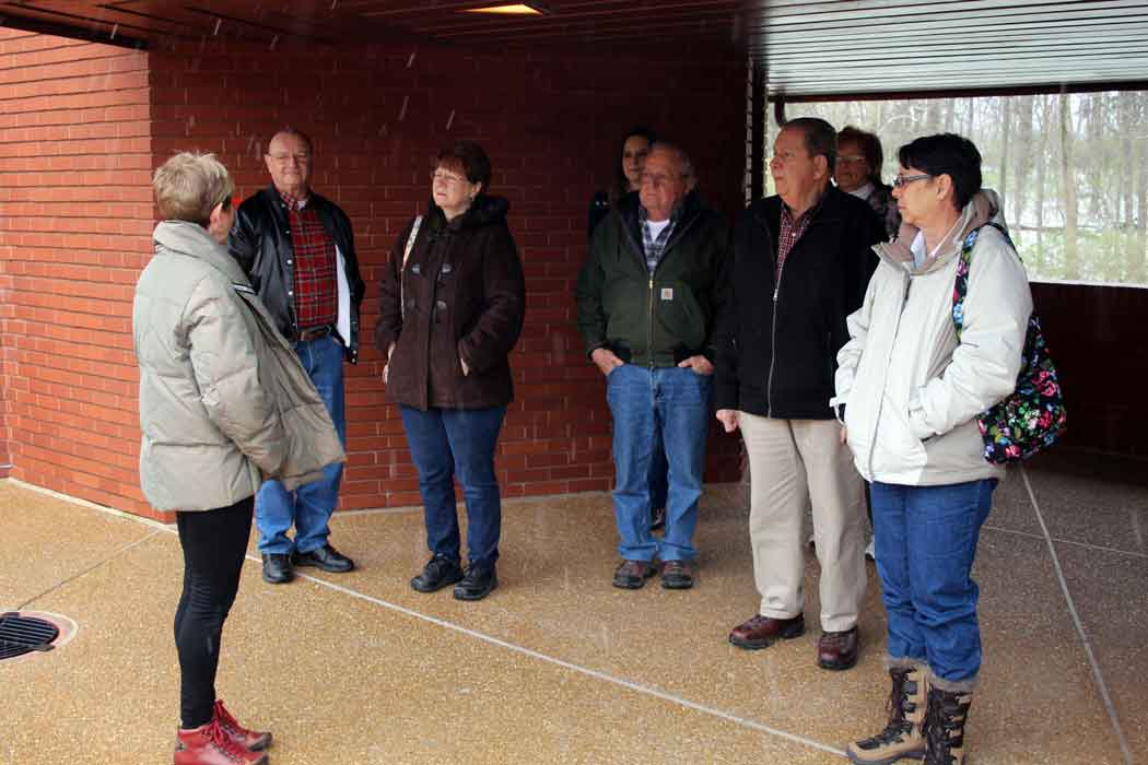   Tour guide Martha with her group of Model Aers  