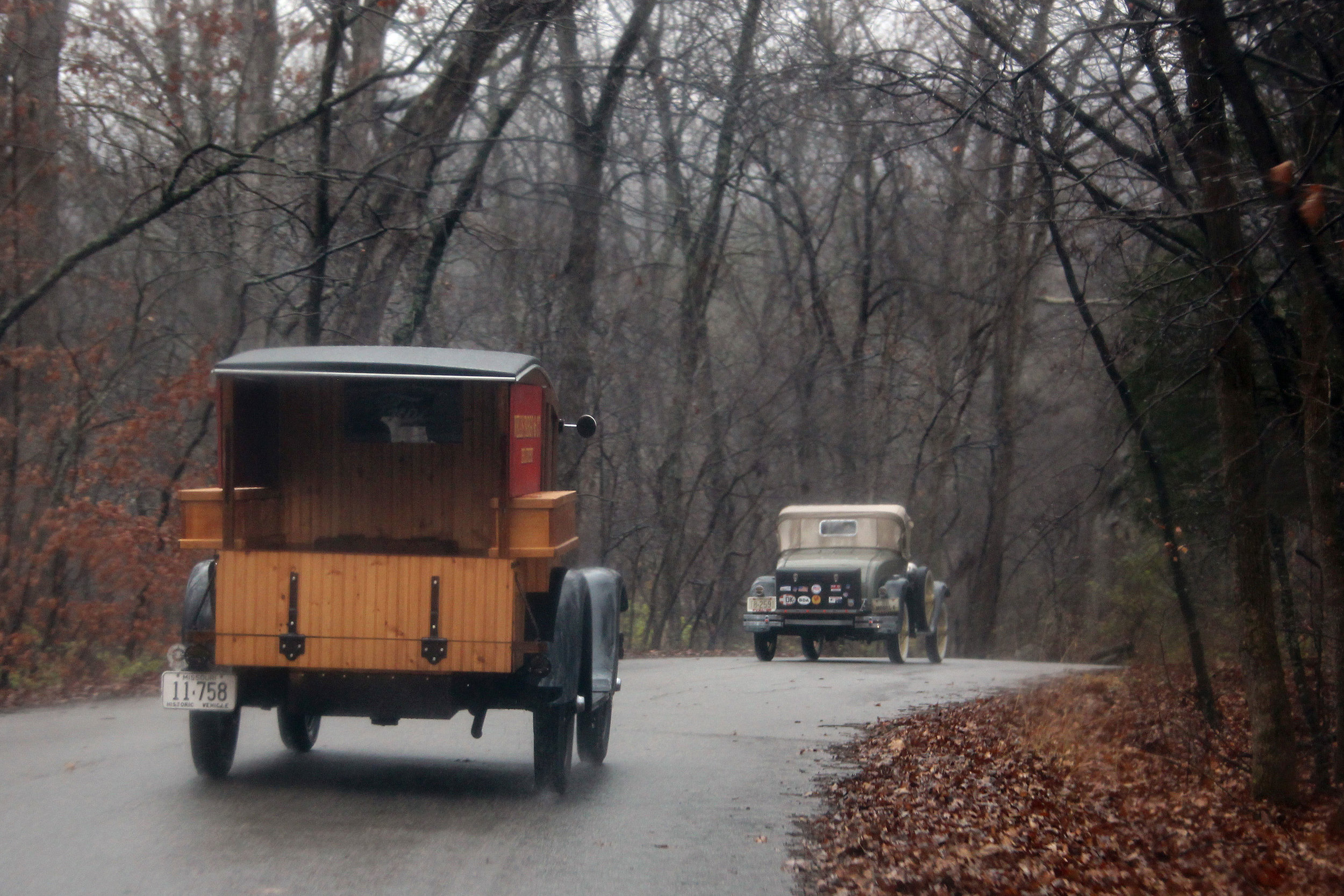   The Peistrups and the Burks Model A's en route to the event regardless of the rain  
