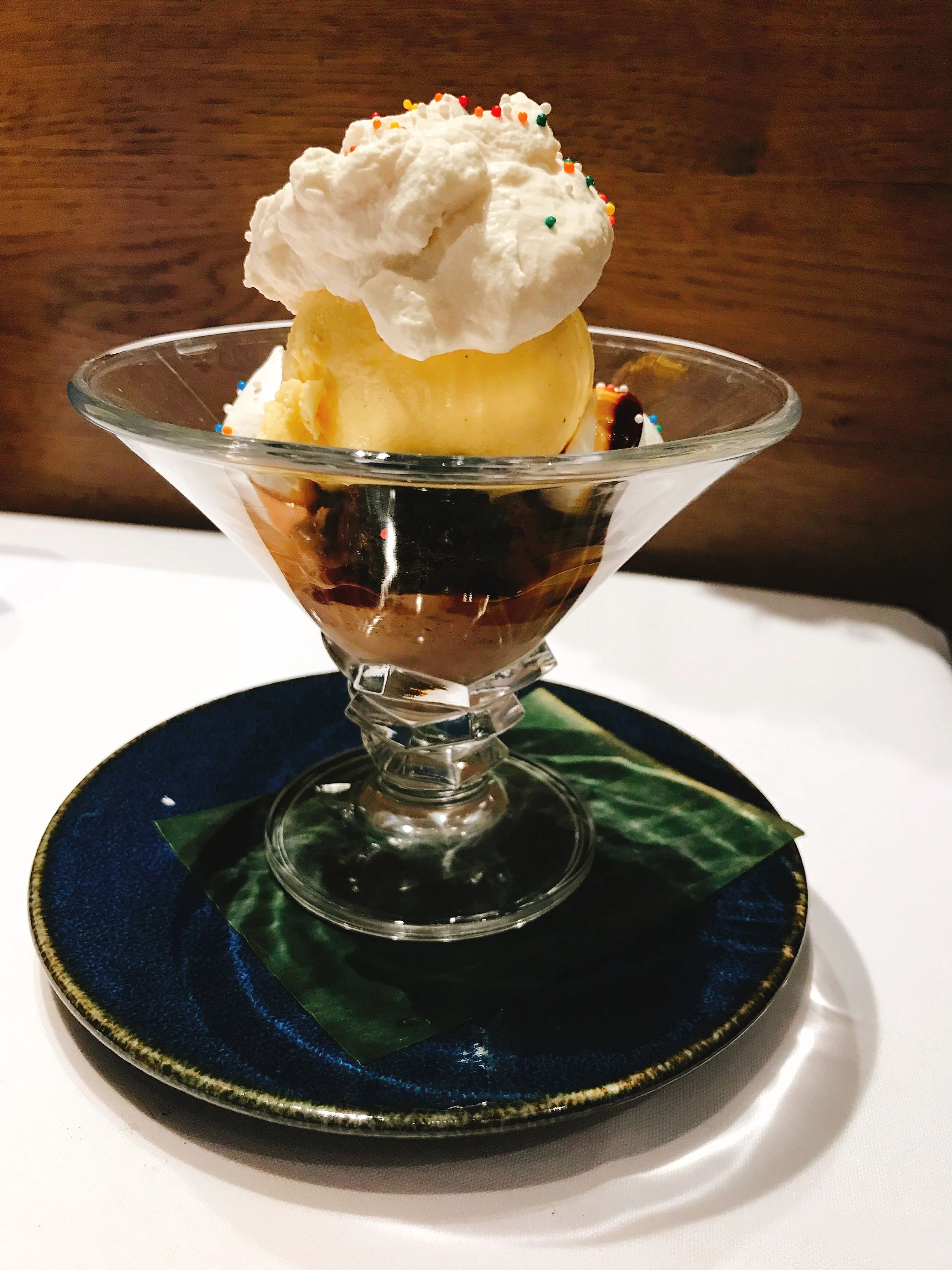 Cajeta Brownie Sundae: Mexican vanilla-milk chocolate ice cream, Mexican chocolate brownie, cajeta, whipped cream and meringue