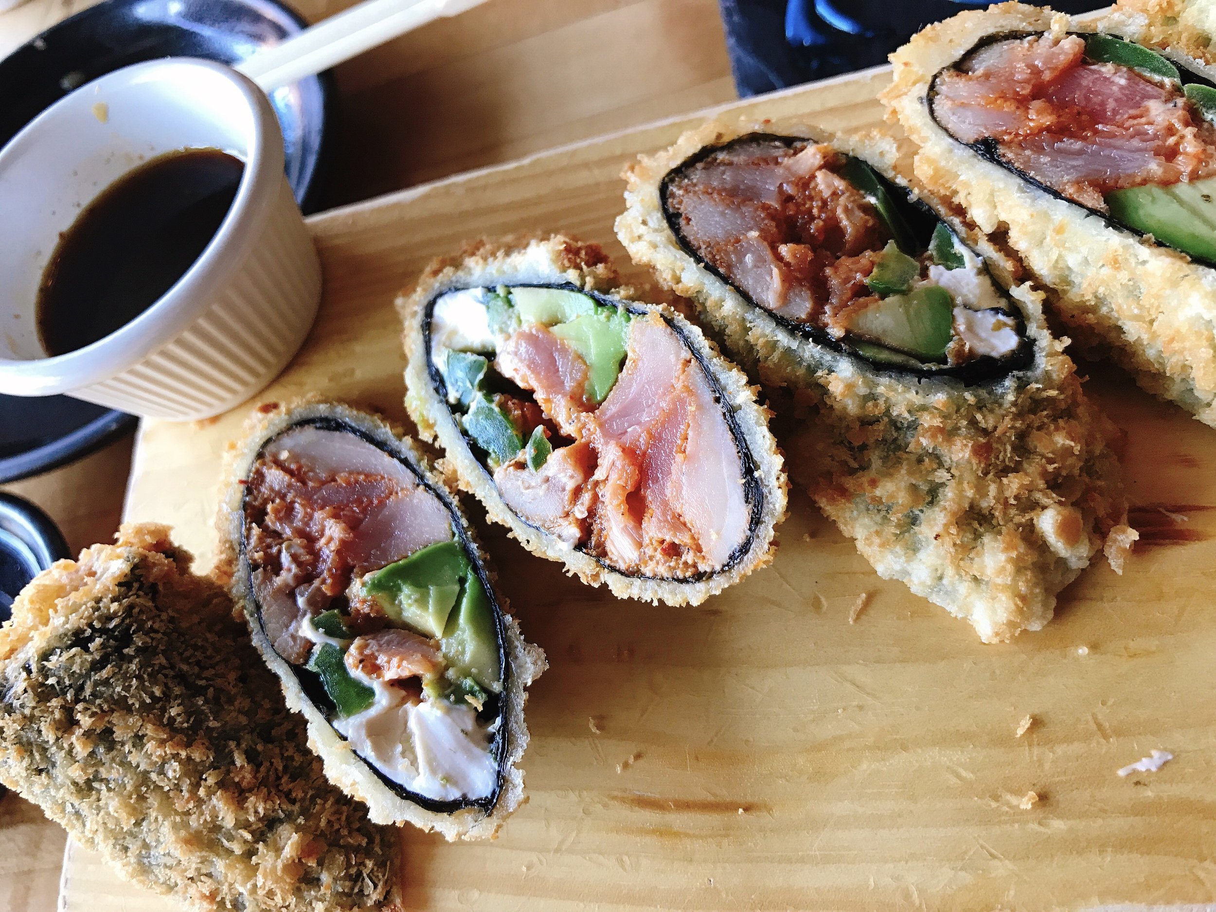 My Favorite Midwest Roll: Ahi Tuna, Avocado, Cream Cheese, Scallions, Masago, Spicy Mayo lightly battered in Tempura