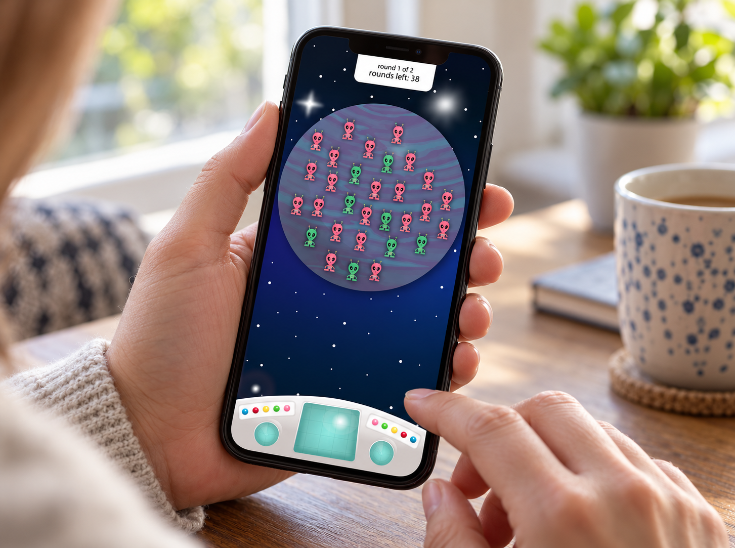 Purple Planet App in Hand-2.png