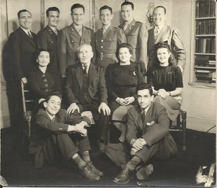 Leah Axelrod and Morris Miller, seated with daughter Mickey Miller Klausner on left and daughter-in-law Shirley Rosner Miller on right. Mickey’s sons William, l, and Robert, r on floor. Standing: David Klausner, Si, Oscar, Stanley, Irving and Mannie.