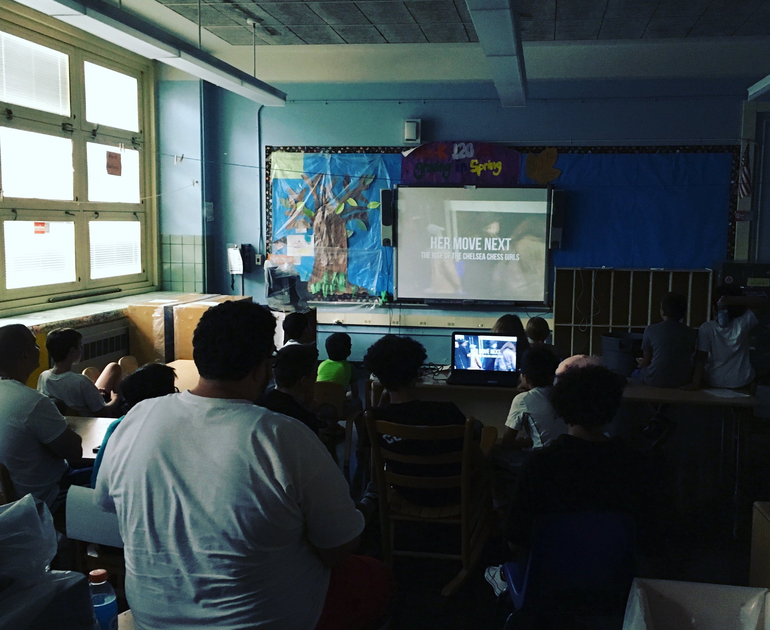 Campers enjoy a first screening of "Her Move Next"