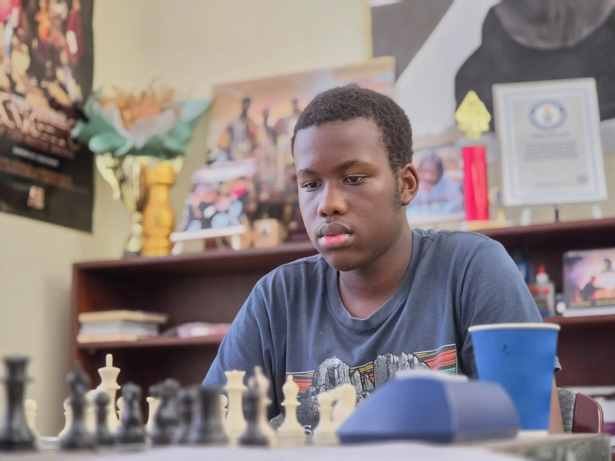 Kuka Kyle, a 16 year old Kenyan chess prodigy, is in NYC to train at the Elite Training Camp held in Times Square. Kyle who recently took 2nd place at the Kenyan National Chess Championship will compete in two rated games per day along with lessons a