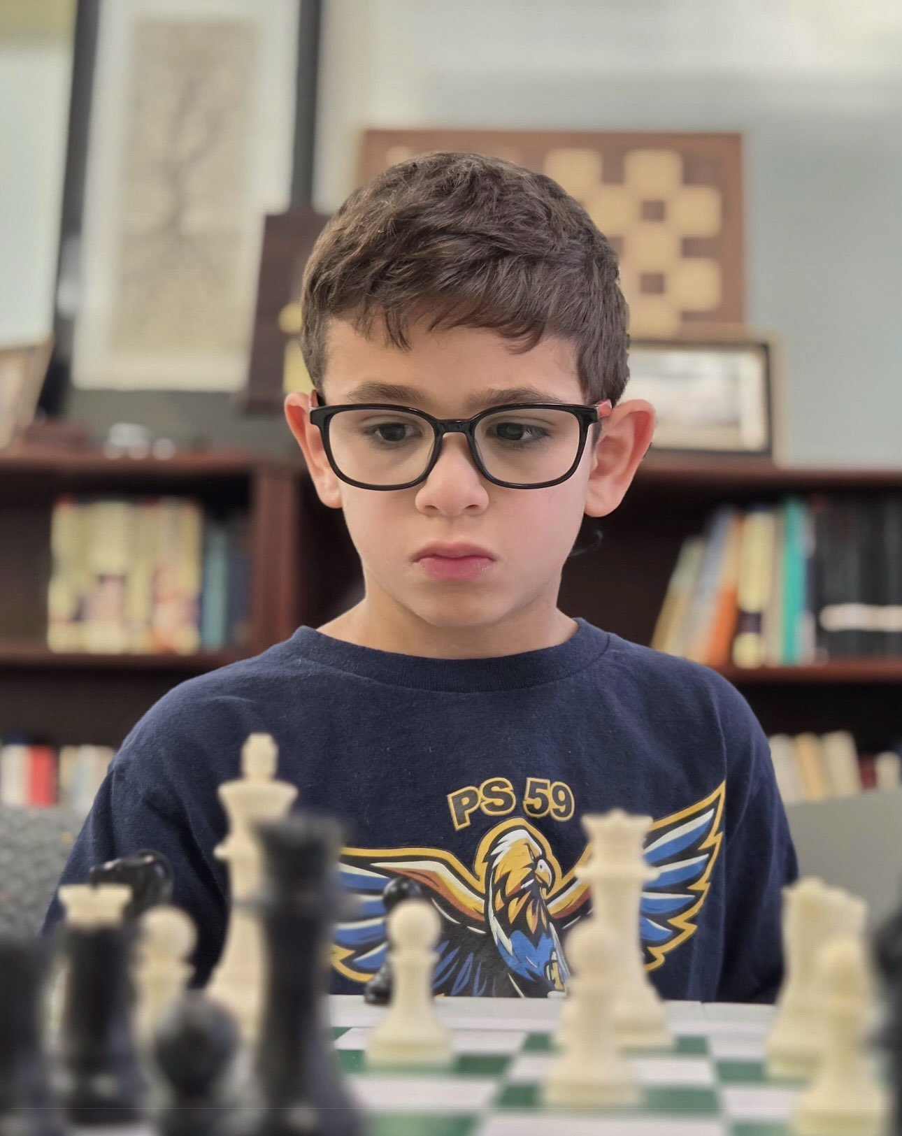 Huge shout out to PS 59s very own Austin Schnitzer on breaking 1600 uscf! Last year Austin started 1st grade rated 500 and is starting 2nd grade rated 1600+ Austin is now in the top 10 for his age group in the Nation, his future is very bright! #ps59